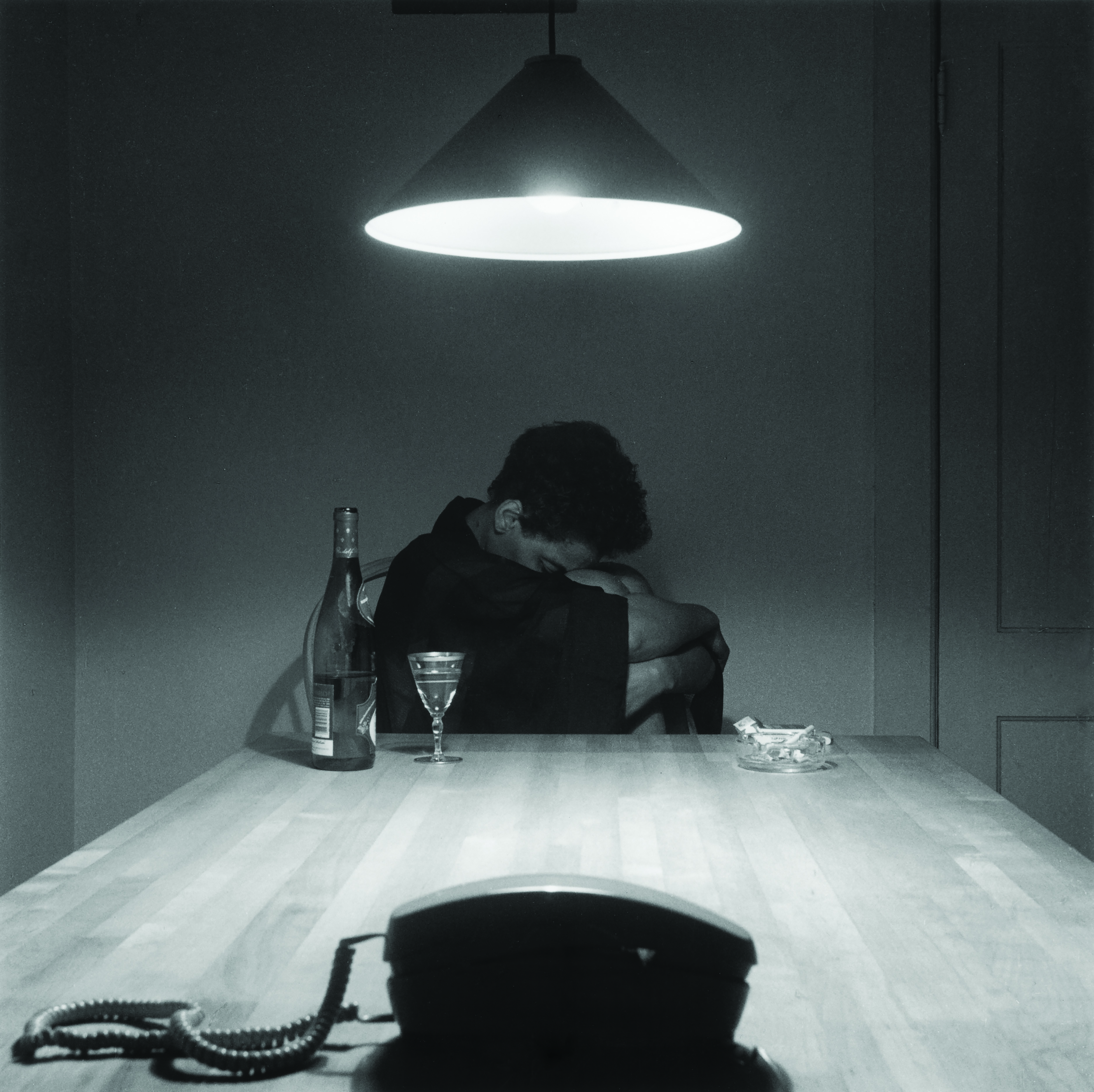 The artist appears in her <em>Untitled (Woman and Phone),</em>1990, part of her career-making <em>Kitchen Table Series</em>.