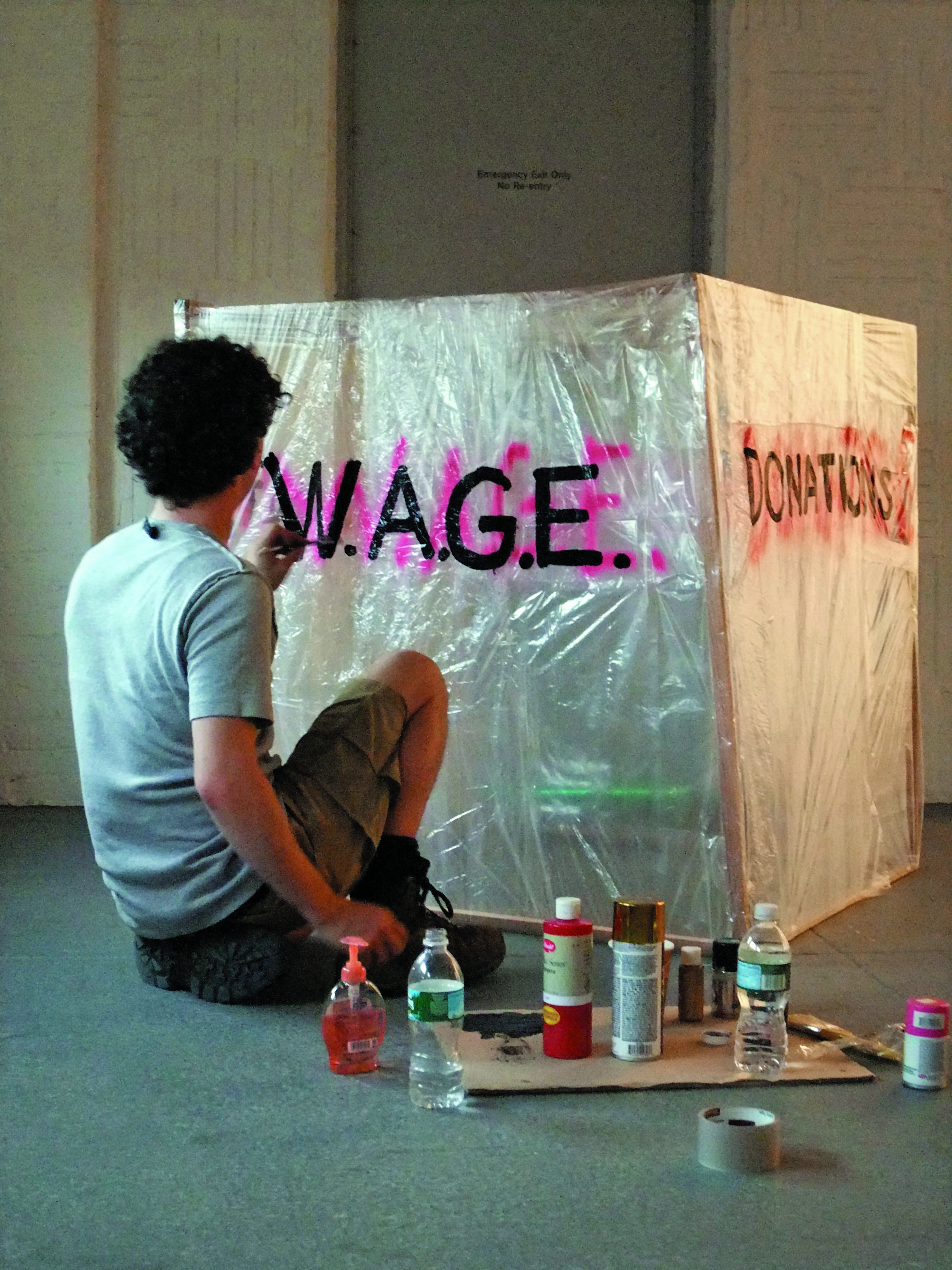 Dean Daderko preparing a complaint, suggestions and donation box for W.A.G.E.’s booth at No Soul for Sale.