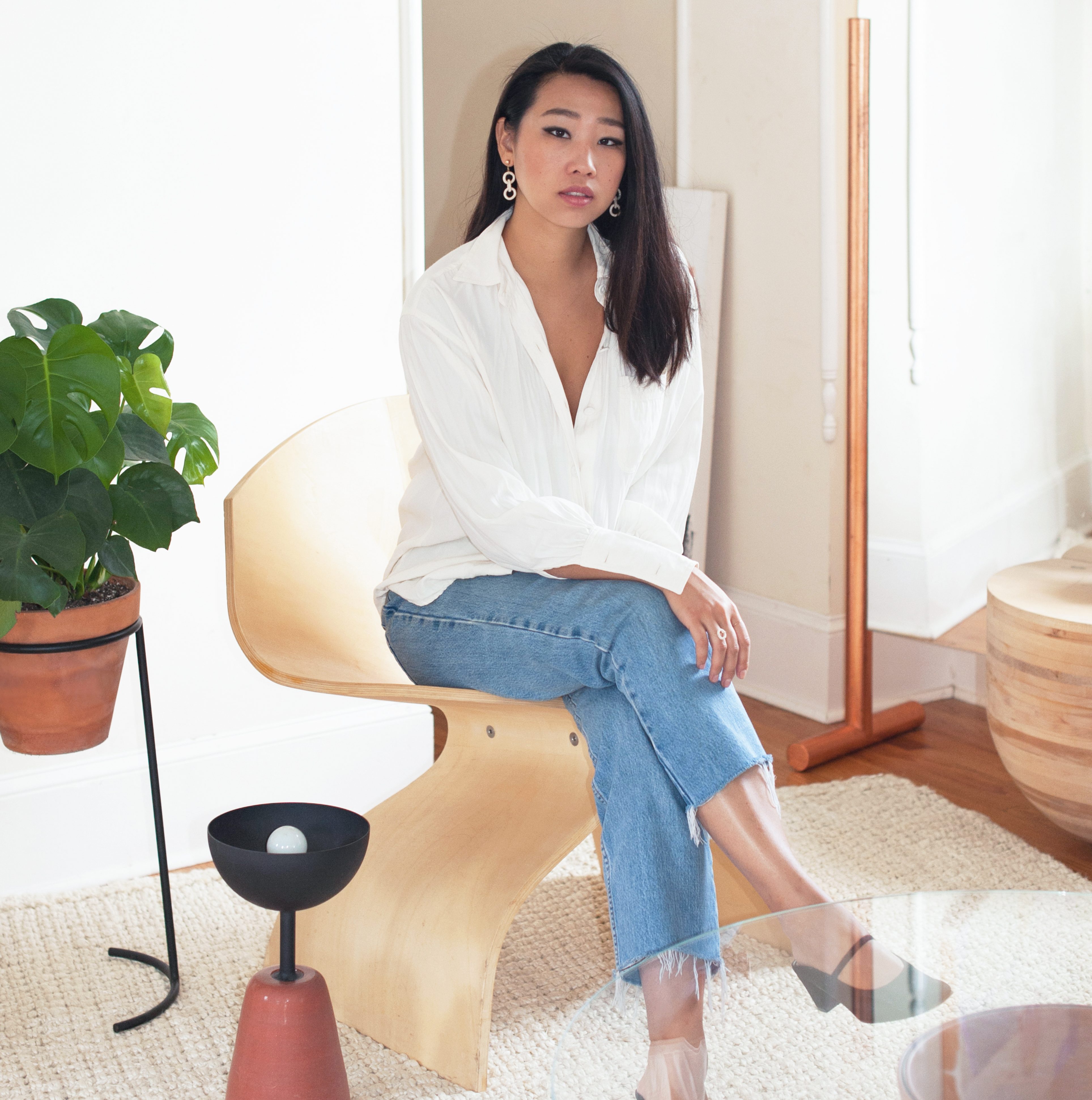 Eny Lee Parker in her apartment. Portrait by Anna Heritage. 