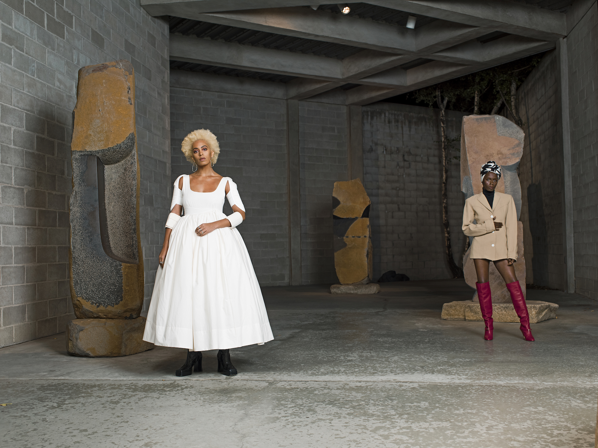 Solange Knowles and Toyin Ojih Odutola with Isamu Noguchi’s <em>Deepening Knowledge</em>, 1969 (left) <em>Venus</em>, 1980 (right) and Brilliance, 1982. Styled by Solange Franklin. 