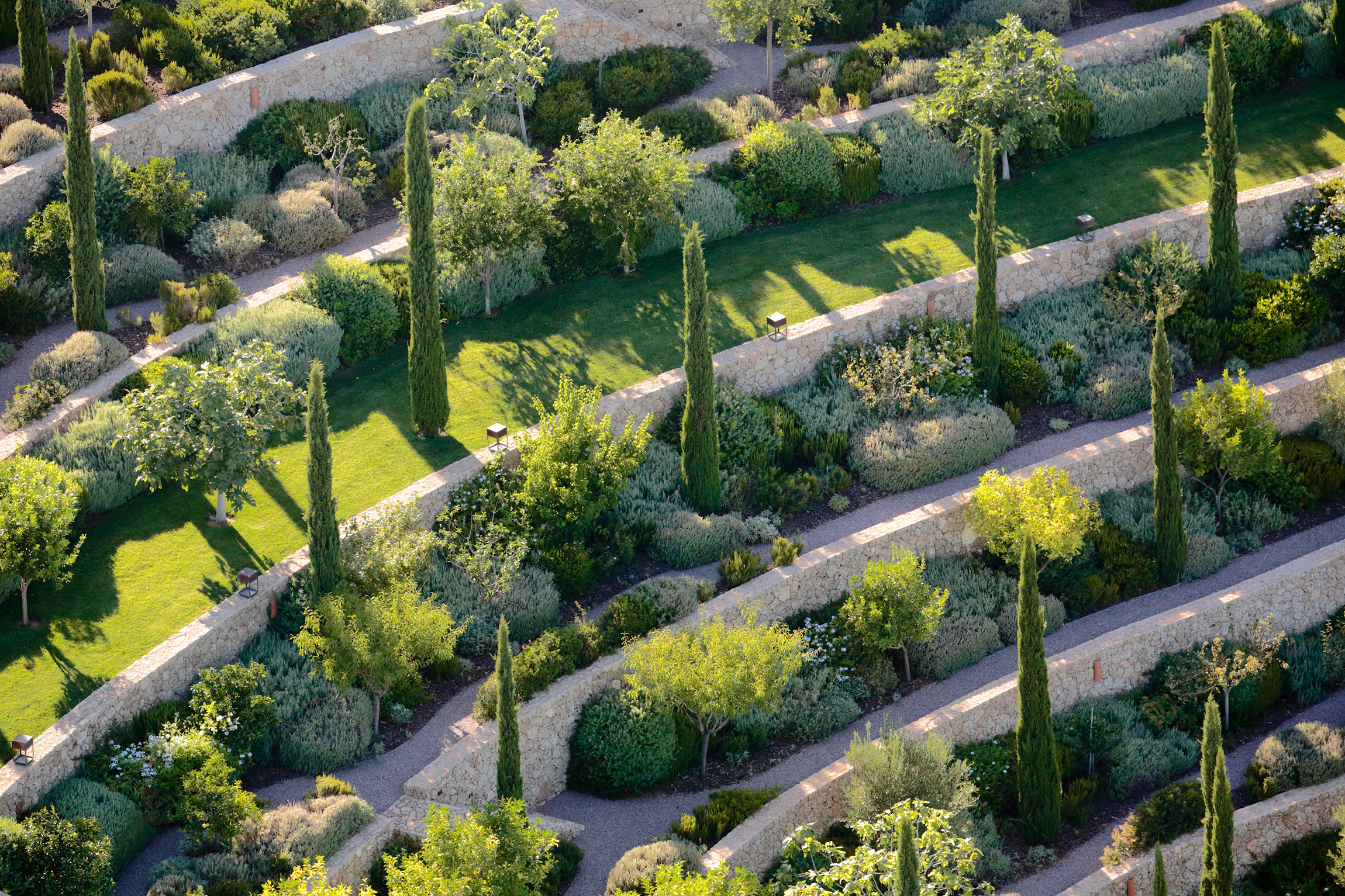 Greenery cascades from a hilltop home above the Aegean Sea down to the water in Fernando Caruncho’s project in Porto Heli, Greece.