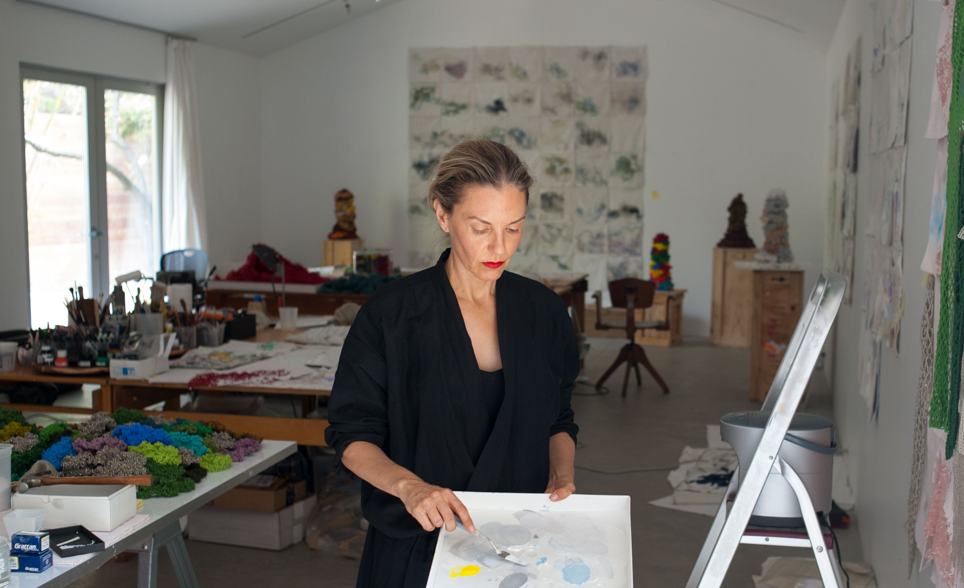 Liza Lou in her Topanga Canyon studio photographed by her husband, Mick Haggerty. 