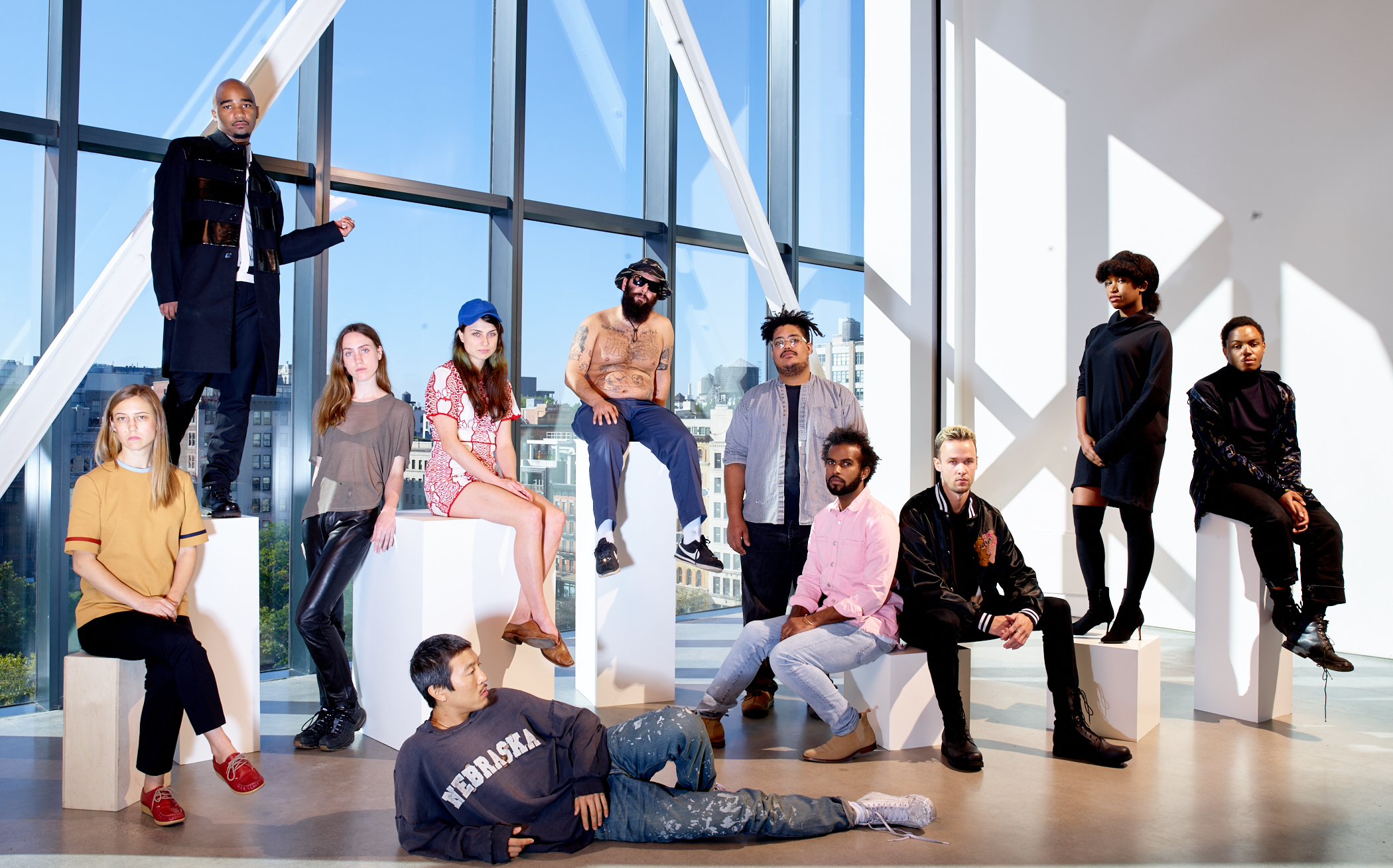 From left: Caitlin Keogh, Jacolby Satterwhite, Valerie Keane, Rachel Rossin, Stewart Uoo, Alex Becerra, Andrew Ross, EJ Hill, Brian Kokoska, Tschabalala Self and Eric Mack. Portrait by François Dischinger, produced by Michael Reynolds. 