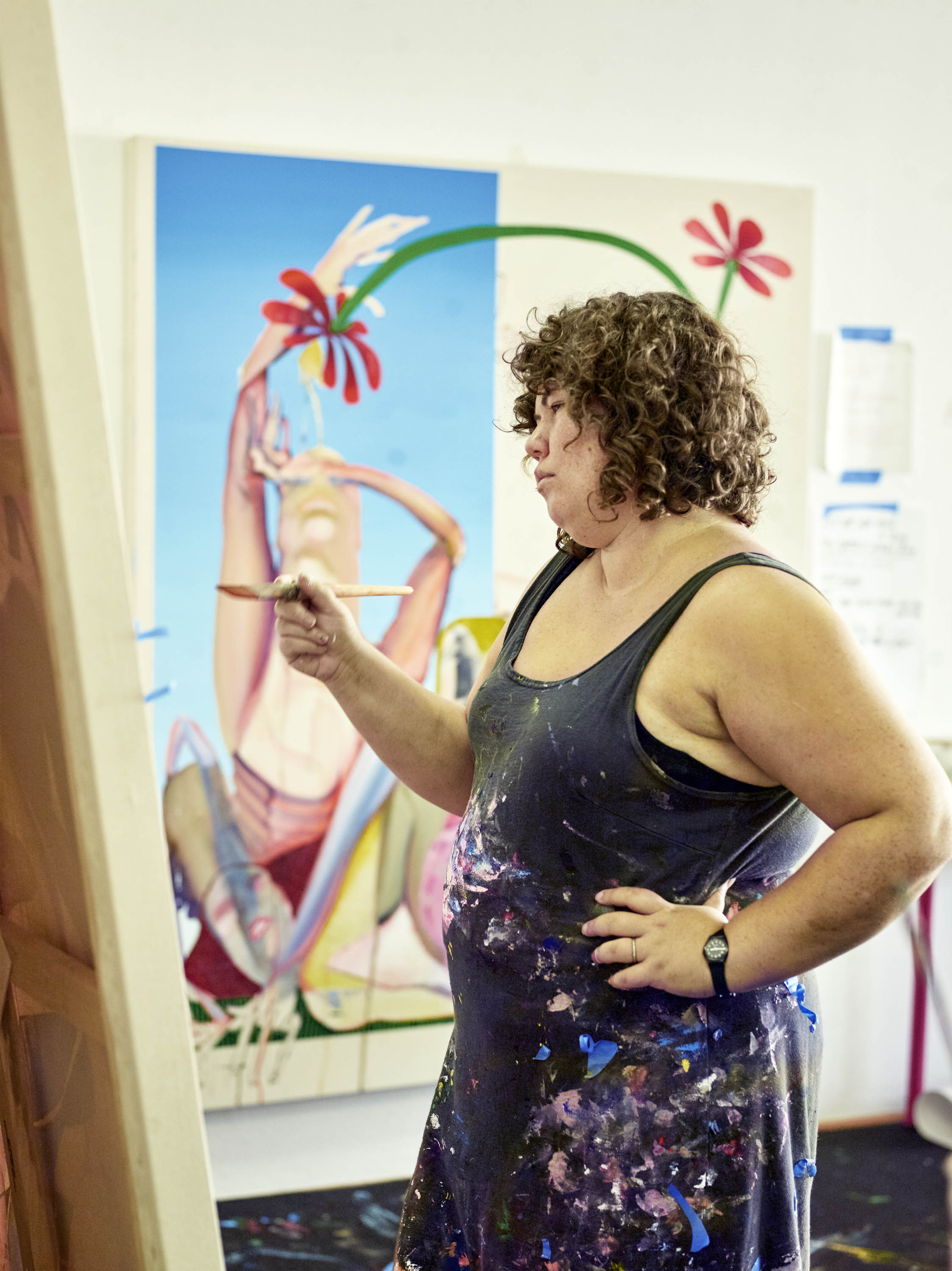 Christina Quarles painting in her Los Angeles studio, 2018.