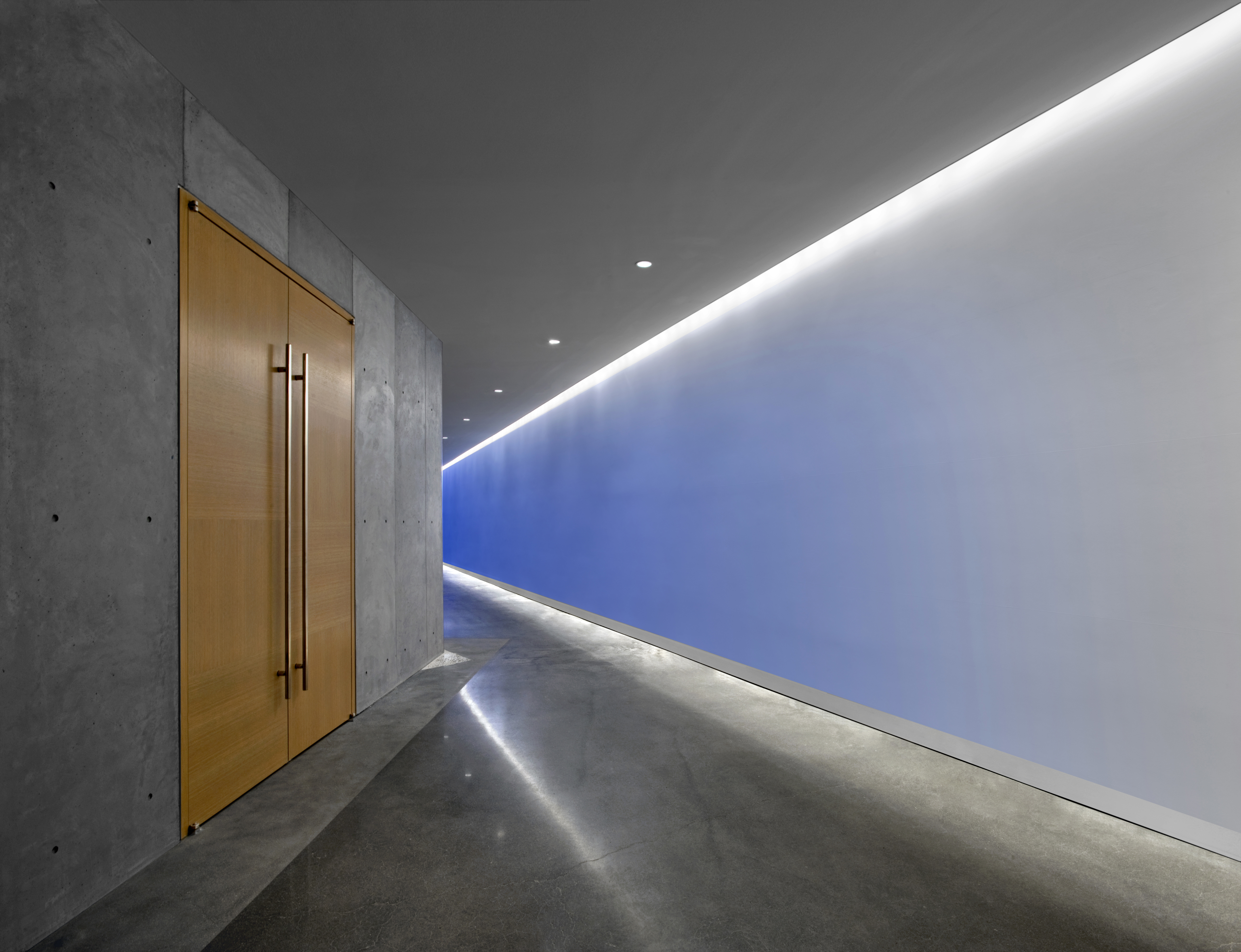 The main corridor at UOVO, NYC, featuring a commissioned mural by Pieter Vermeersch. Courtesy of UOVO. 