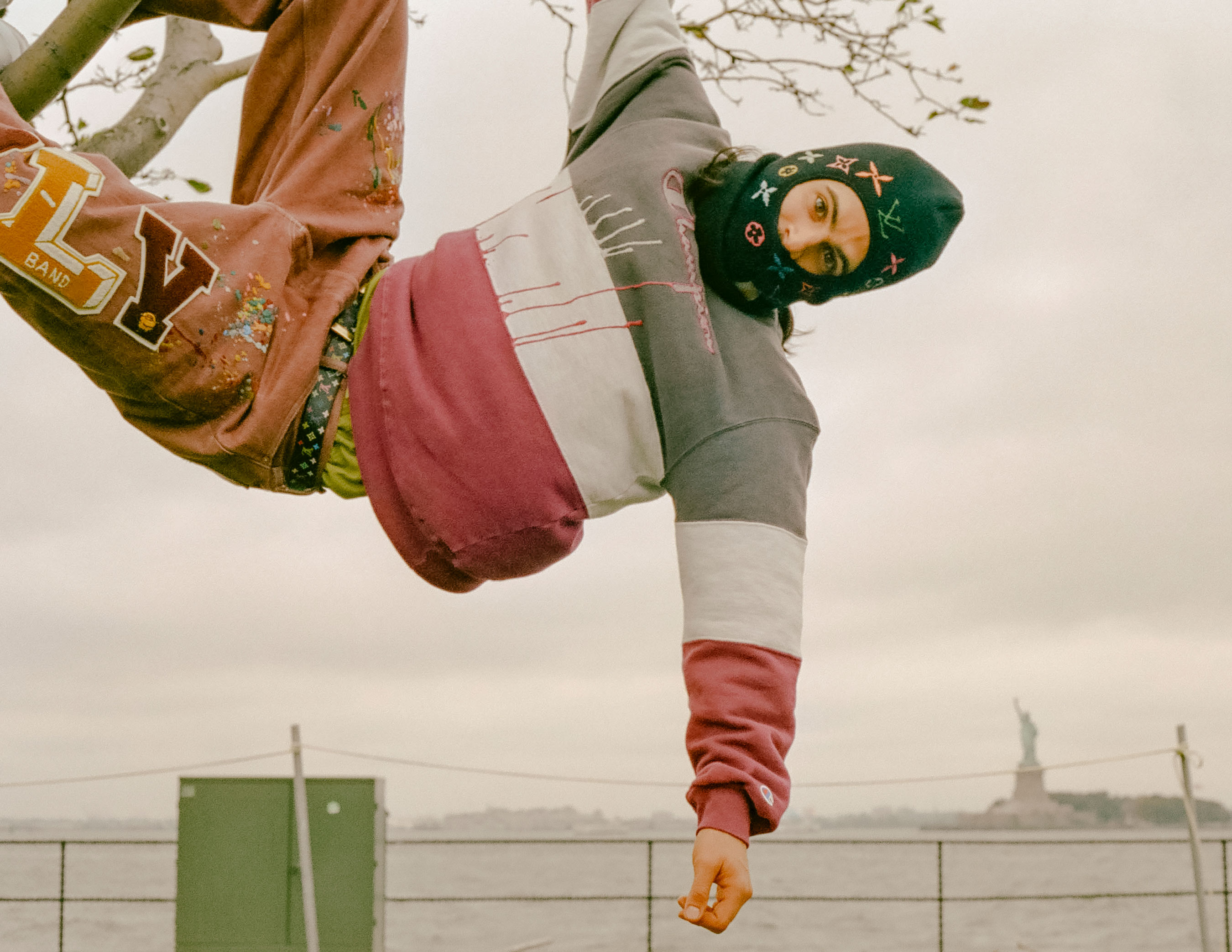 Designer Pat Peltier is dressed in the hand-embroidered Carhartt facemask, vintage Champion crewneck and hand-embellished vintage Levi’s jeans.