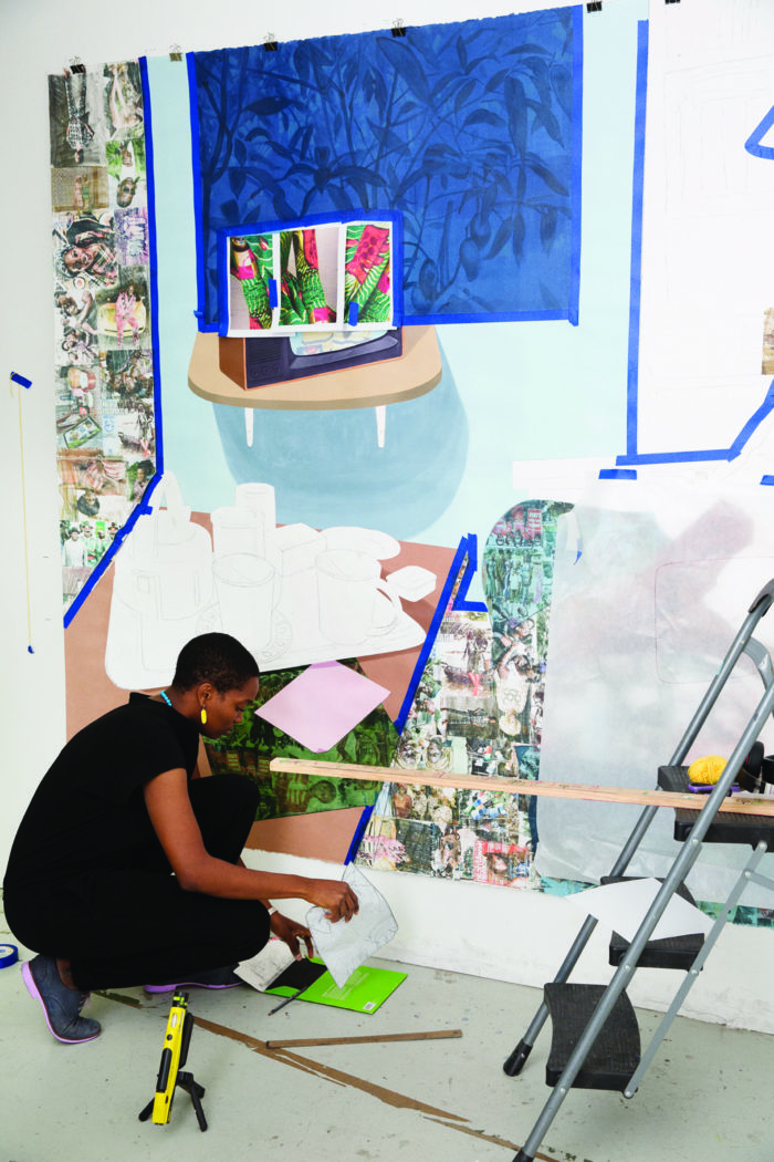 Njideka Akunyili Crosby photographed in her studio by Brigitte Sire.