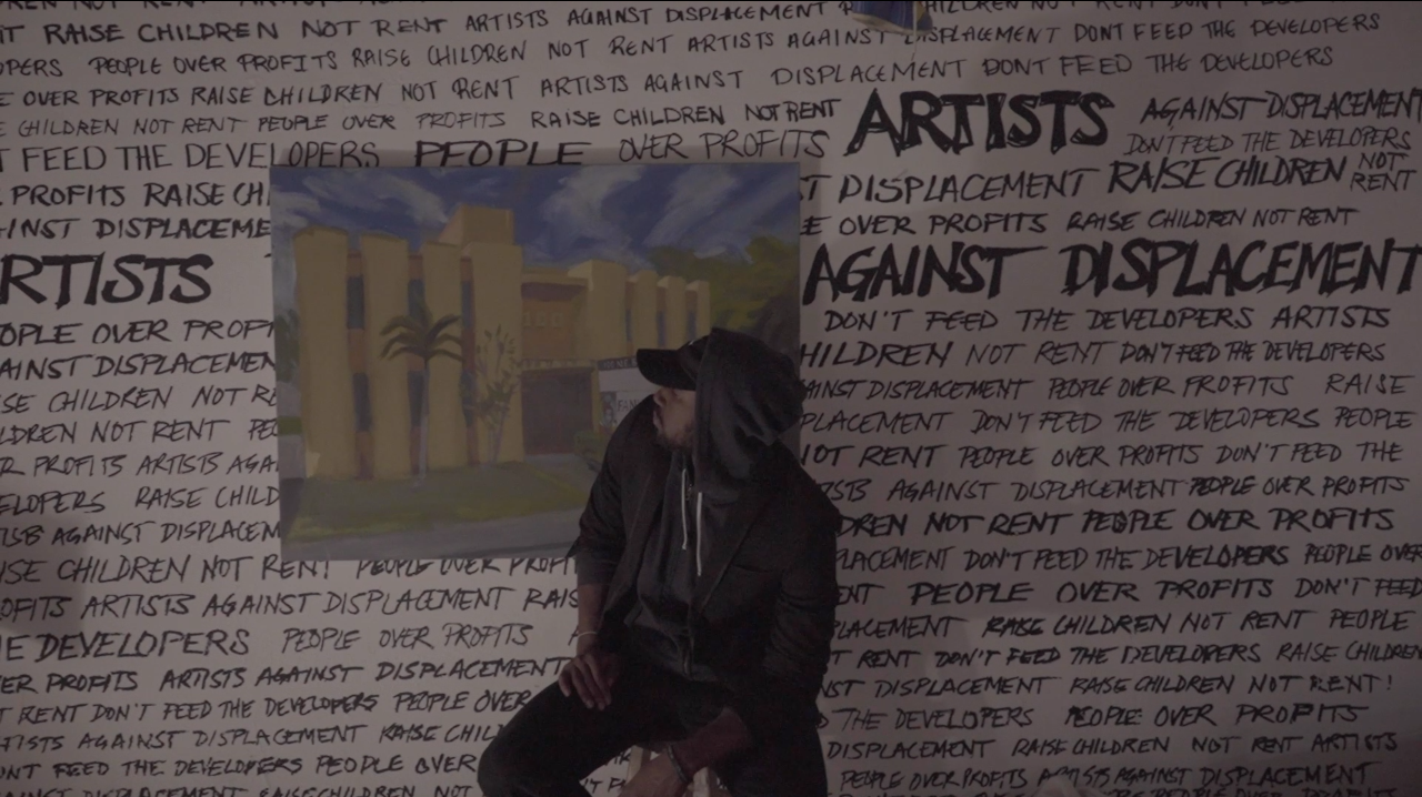 A still from a video of opening night at 'Where the Land is Free,' by FXRBES. Courtesy of FXRBES, VOICES: Poetry for the People, and Community Justice Project.