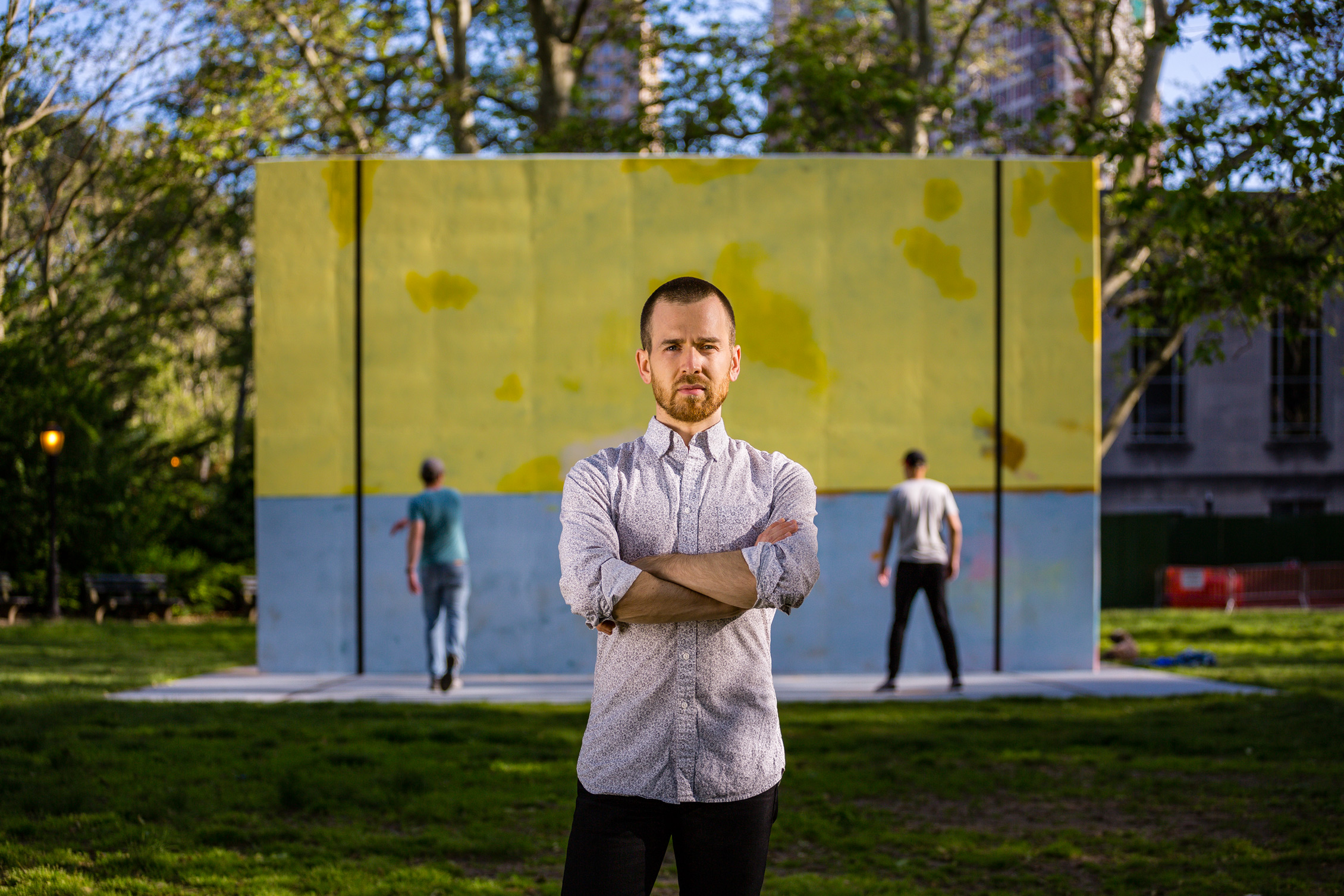 Public Art Fund Curator, Daniel S. Palmer in front of his recent curatorial project, Harold Ancart: Subliminal Standard. Photo by Nicholas Knight. 