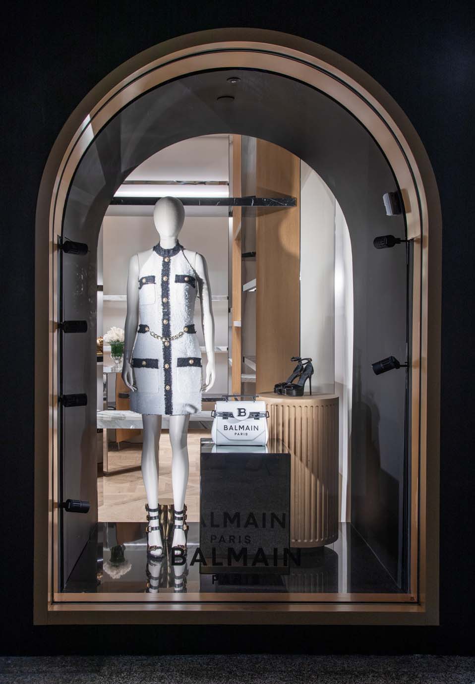 Balmain’s Bal Harbour Shops boutique showcases a tweed dress and the BBuzz bag.