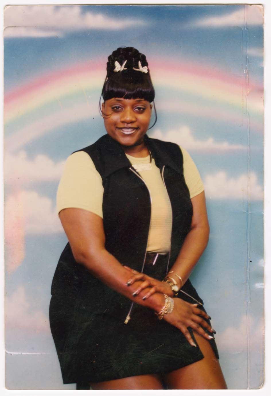 Shawntel Dunbar, 1996, at Rainbow Shoe Repair. Photo by Ilya Shaulov.