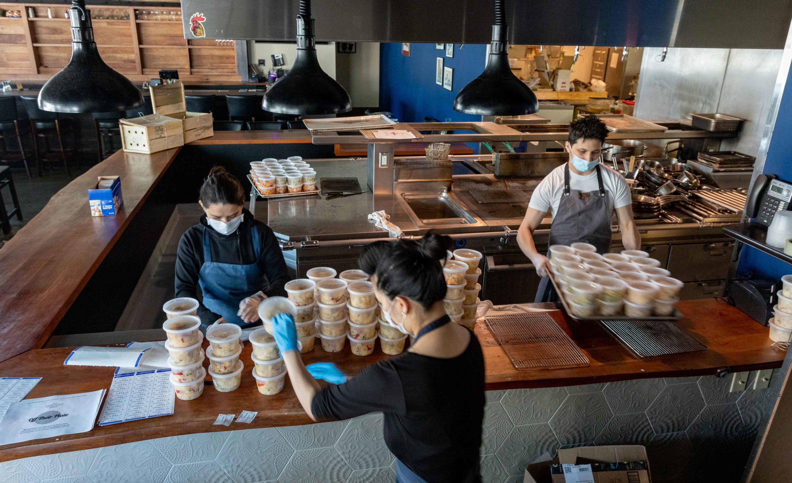 Employees at PAGU in Boston prepare meals for frontline workers during the COVID-19 pandemic. Photo by Keiko Hiromi/Off Their Plate.