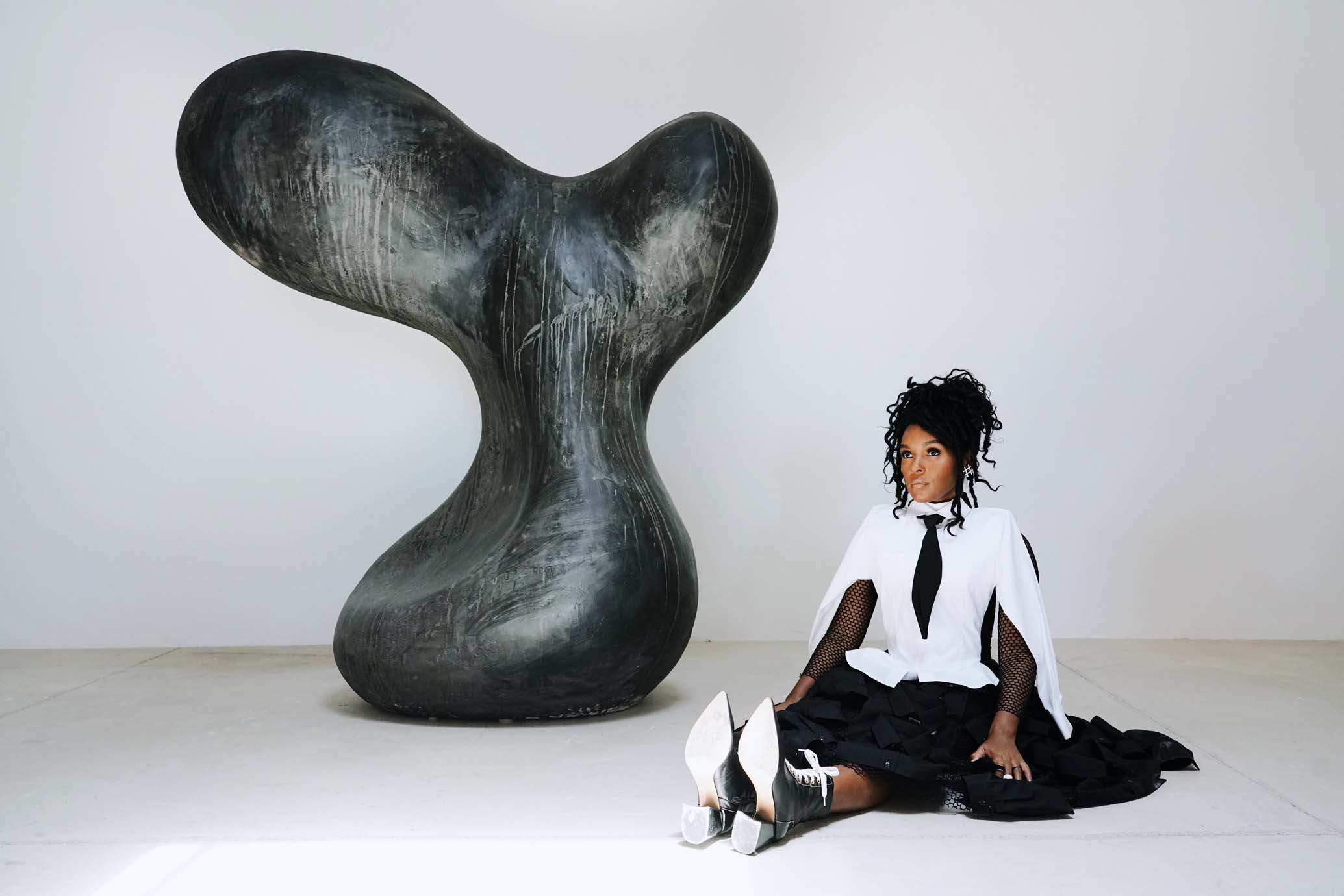 Styling by ALEXANDRA MANDELKORN sculptures by rogan gregory. Monáe wears Jean Paul Gaultier dress Adeam shoes Jenny Bird earrings Tuleste rings.