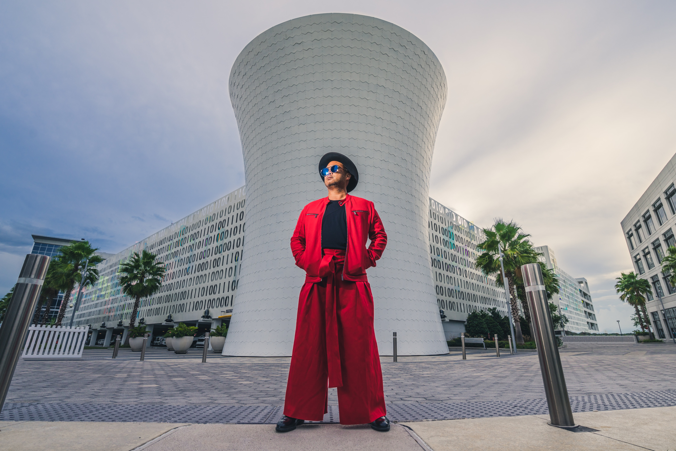 Artist Jefrë stands in front of his works Code Wall and The Beacon in Orlando, Florida. All photos courtesy of Jefrë.