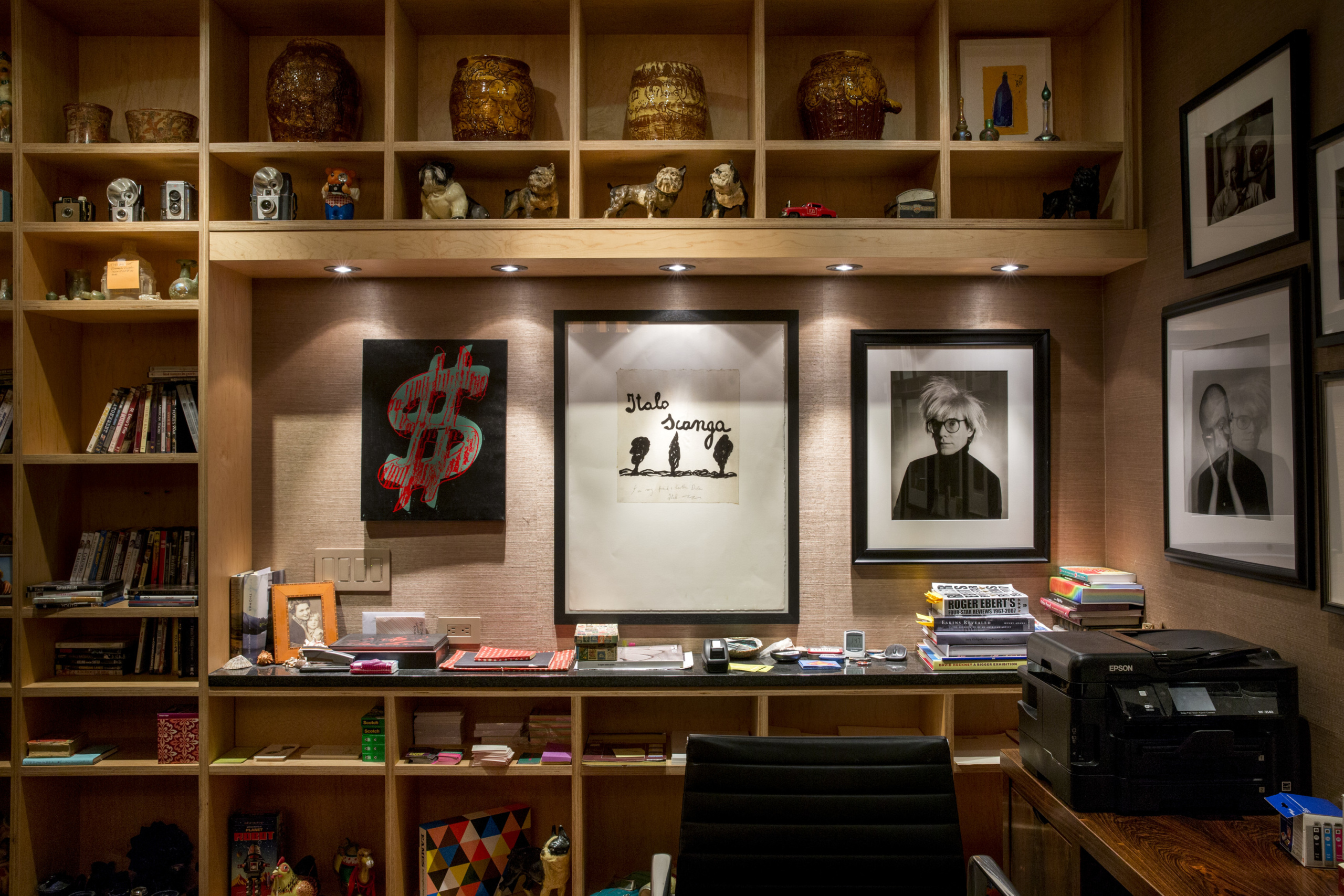 The office in Dale Chihuly’s Seattle home features artworks including Andy Warhol's Dollar Sign, 1981 Italo Scanga's For My Friend and Brother and Christopher Makos's Andy Glasses Four, 1986. Photography by Scott Mitchell Leen. © Chihuly Studio. All Rights Reserved.