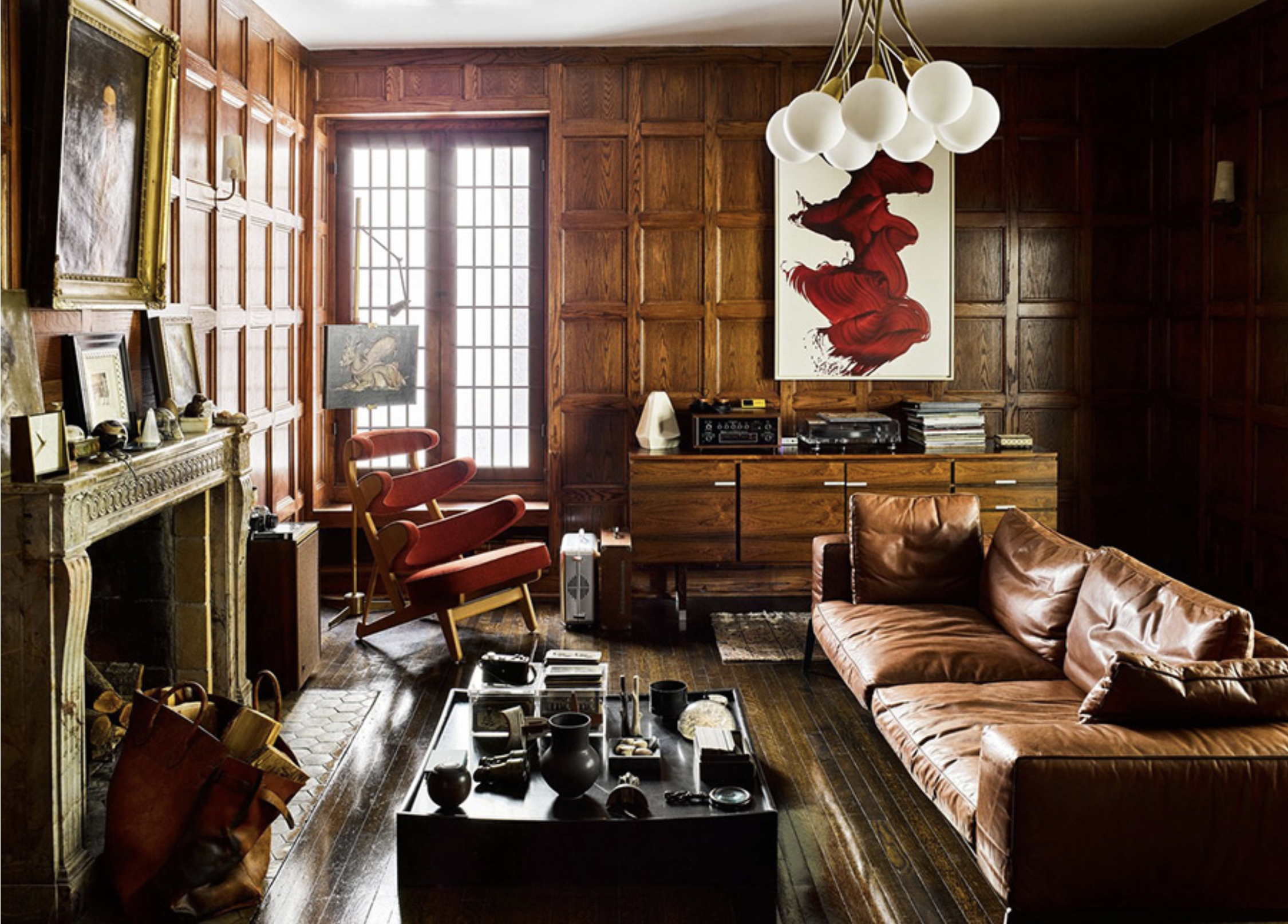 A painting by James Nares hangs in the den of Brigette Romanek's Los Angeles home. Photo by Douglas Friedman.