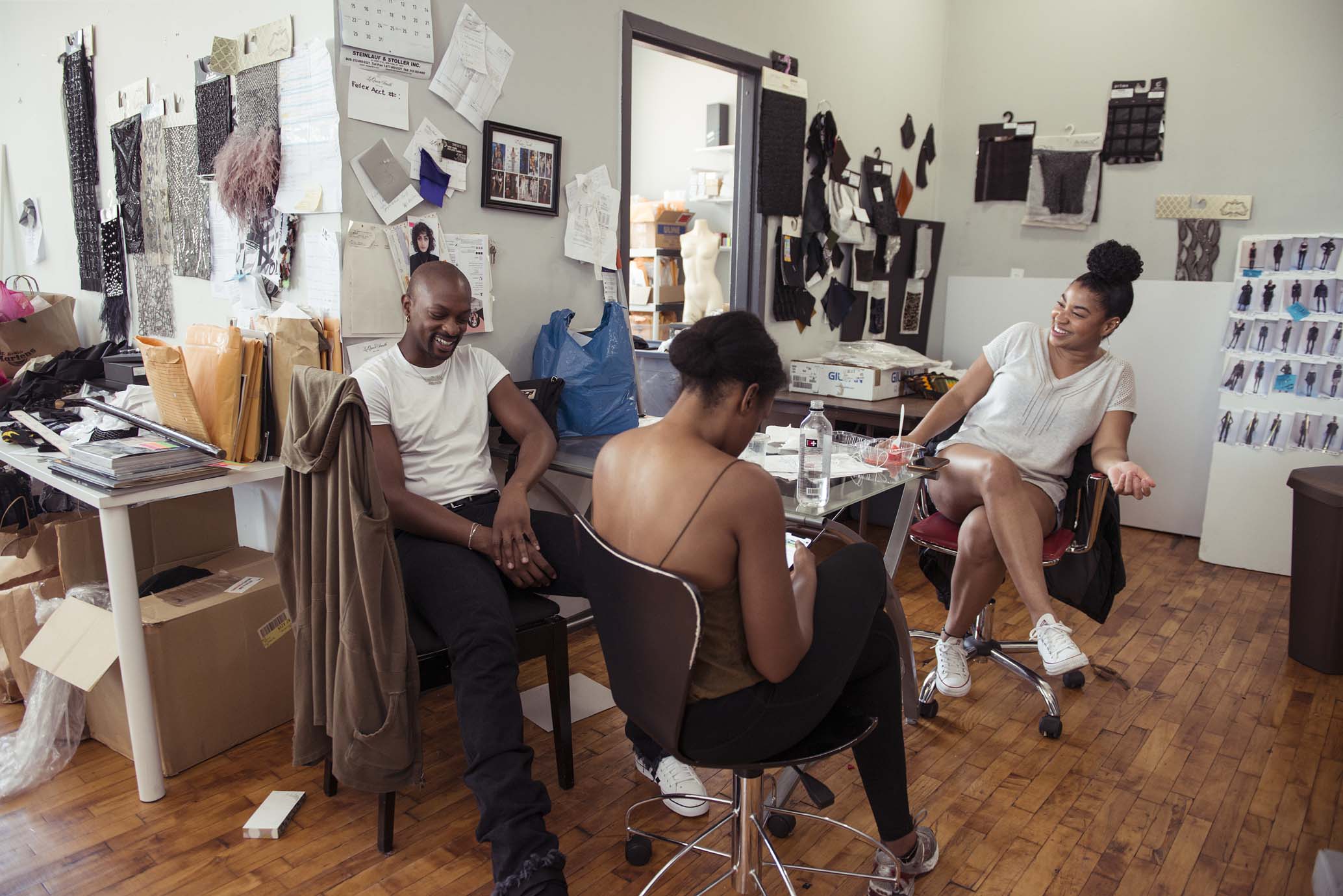 Smith in the studio with Jacqueline Cooper and Joy Massingil.