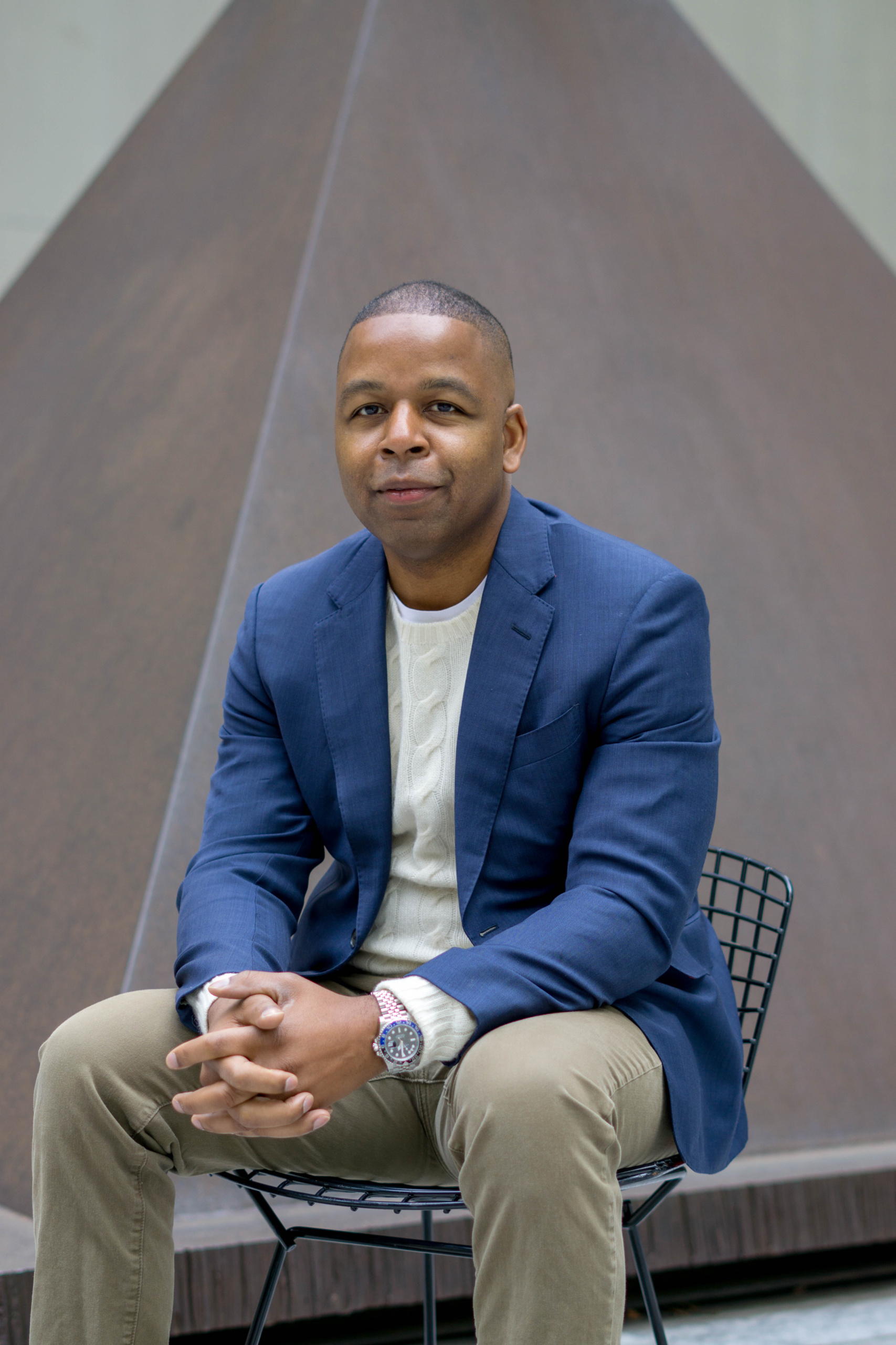 Charles Moore, author of The Black Market, in the MoMA garden. Photo by Kevin Claiborne. 