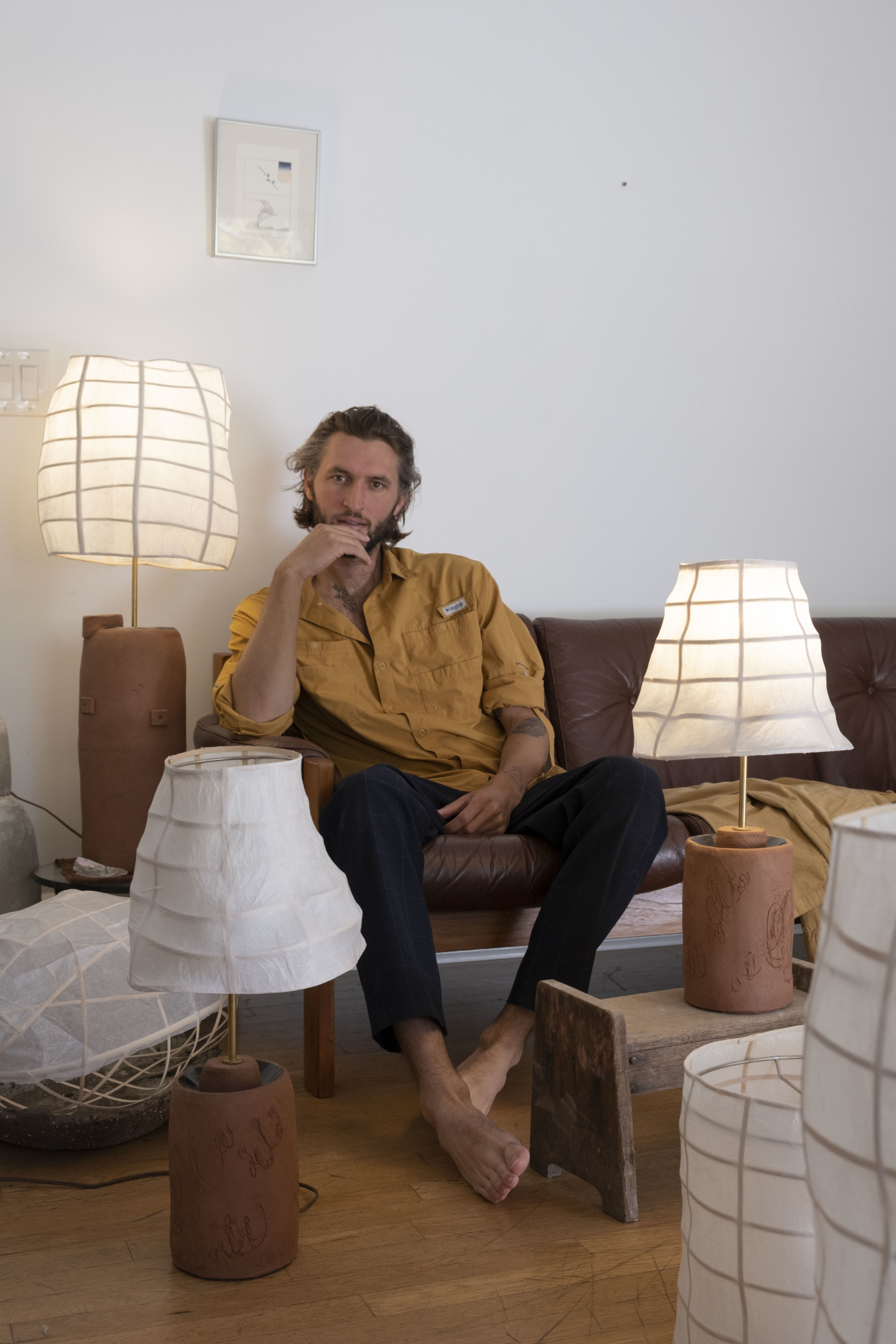 Bennet Schlesinger in his LA studio with lamps from his new series. Photography courtesy of Bennet Schlesinger.