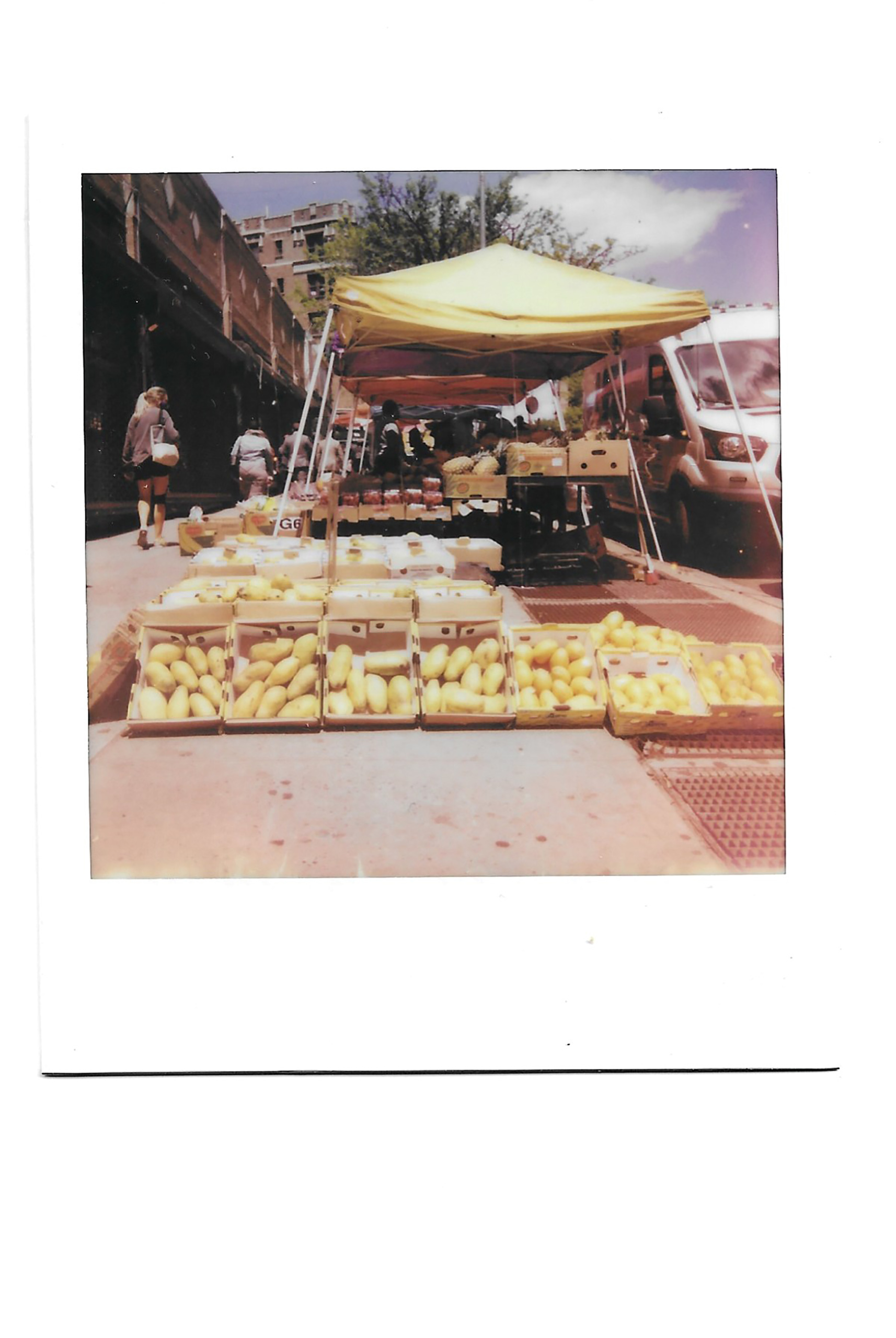 FRUIT STAND ON CORNER OF VERMILYEA AVE AND BROADWAY/ DYCKMAN. Dyckman (now officially Little DR) is where I lived most of my life. It’s what I think of when I think of home. I’ve moved back and forth between neighborhoods and between islands. The produce stand is a necessity in neighborhoods strewn with fast food joints and liquor stores. I worried about them during pandemic lockdowns. The low prices offer affordable healthy choices. They remind the community of outdoor markets in the islands. The most important reminders are on the colorful displays which scream, “MANGOES DON’T GROW ON MANHATTAN TREES.”