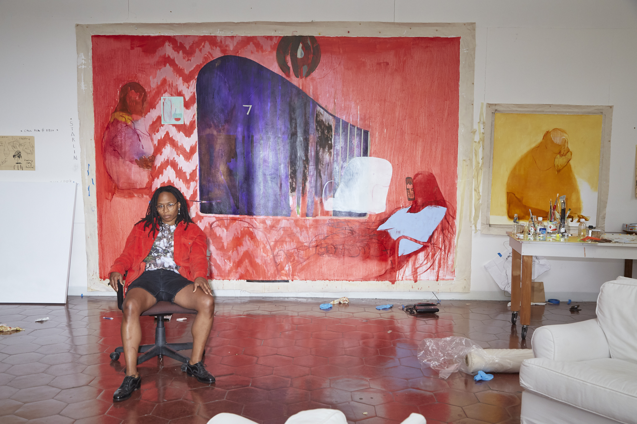 Jennifer Packer in her temporary studio in Rome, where she spent the year after winning the American Academy’s coveted Rome Prize. Portrait by Manfredi Gioacchini.