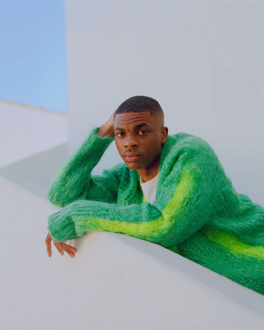 Vince Staples wears a Marni cardigan and his own Lady White Co. shirt. Styling by Corey Stokes. Barbery by Ronnie McCoy III. Grooming by Hee Soo Kwon.