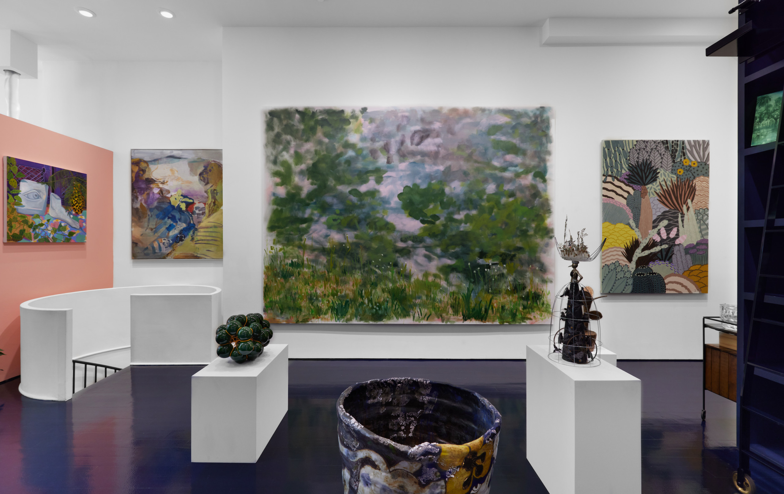 installation view of ridiculous sublime gallery show featuring work by trevor shimizu of forrest, the painting surrounded by other works including ceramic and paintings