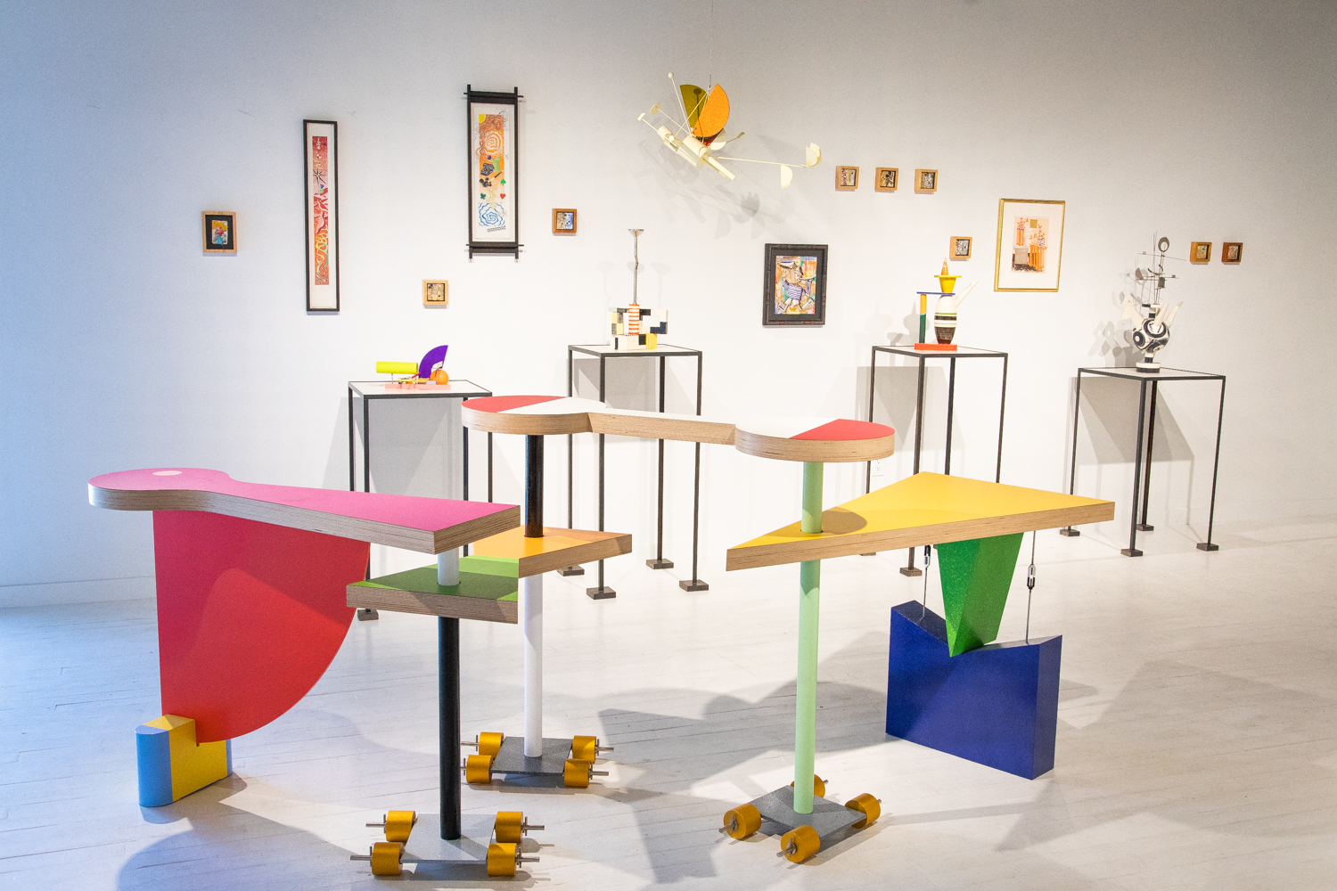 installation view of peter shire show, with modern geometric furniture and art pieces