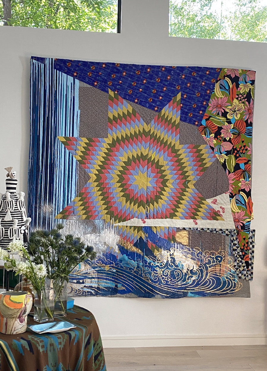 sanford biggers quilt hangs on the wall of jamie tisch home