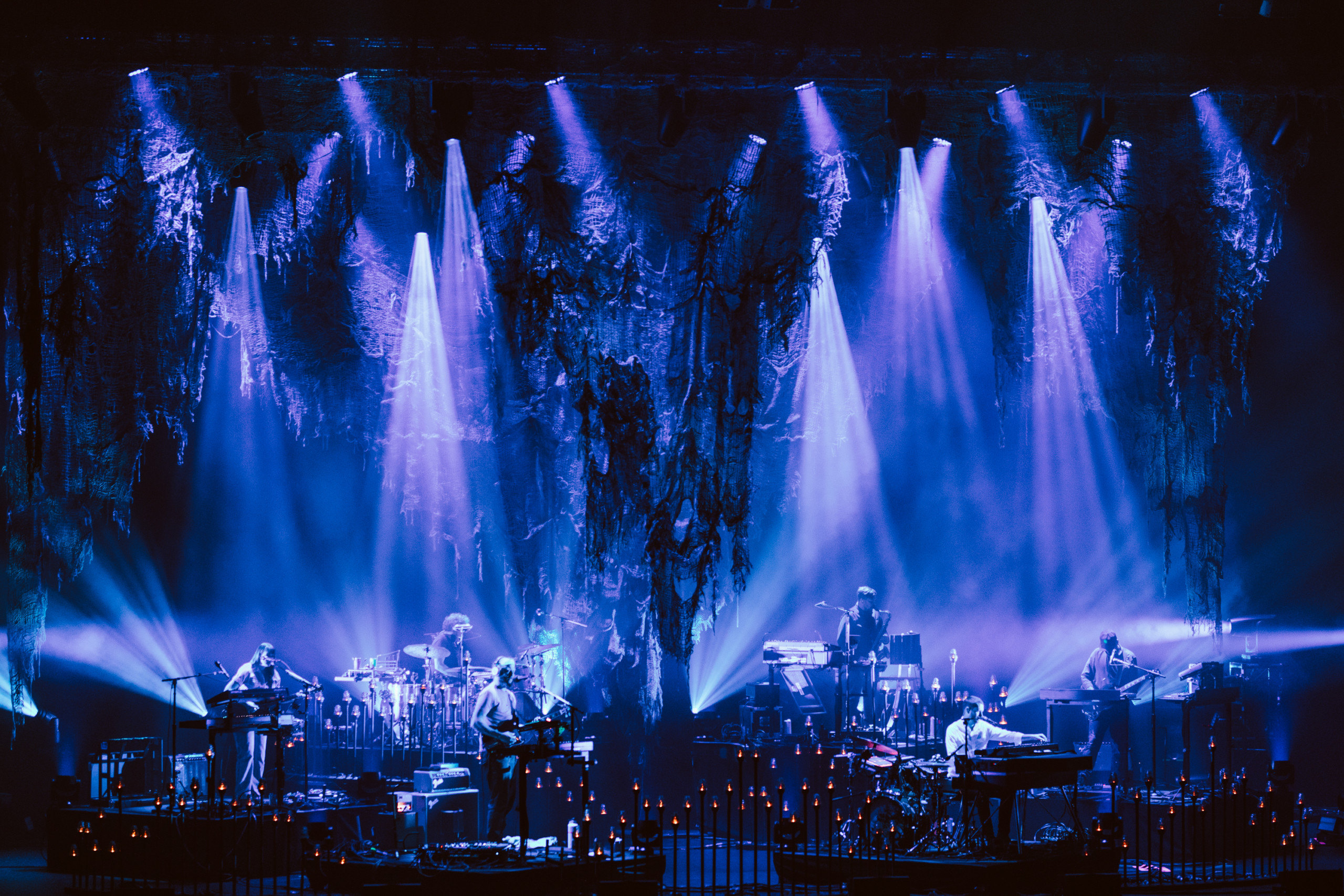 Purple lights enchant the stage at the final show of Bon Iver's 2021 tour.