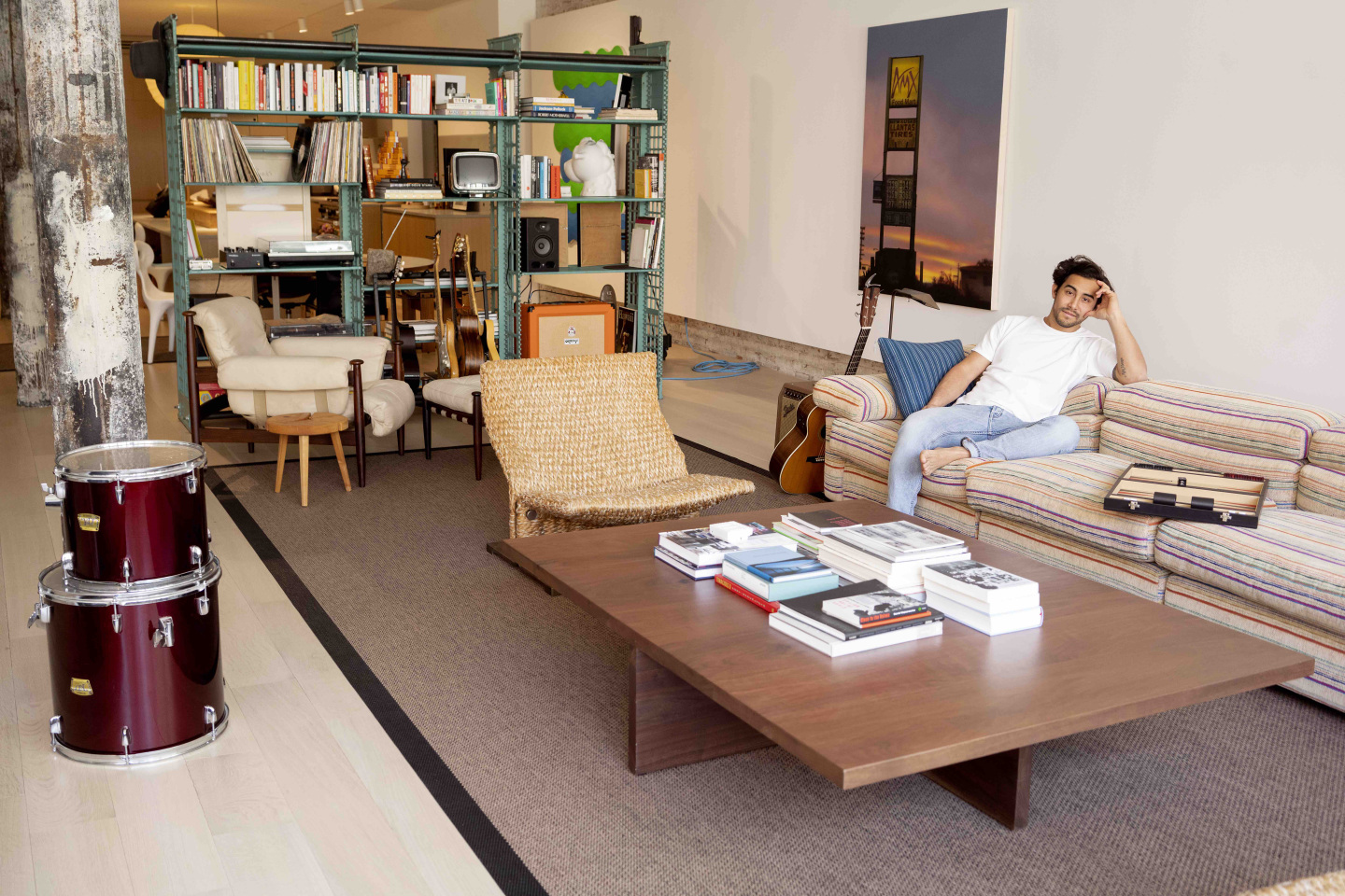 man on sofa in living room