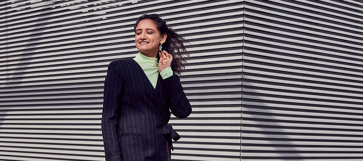 woman in front of building