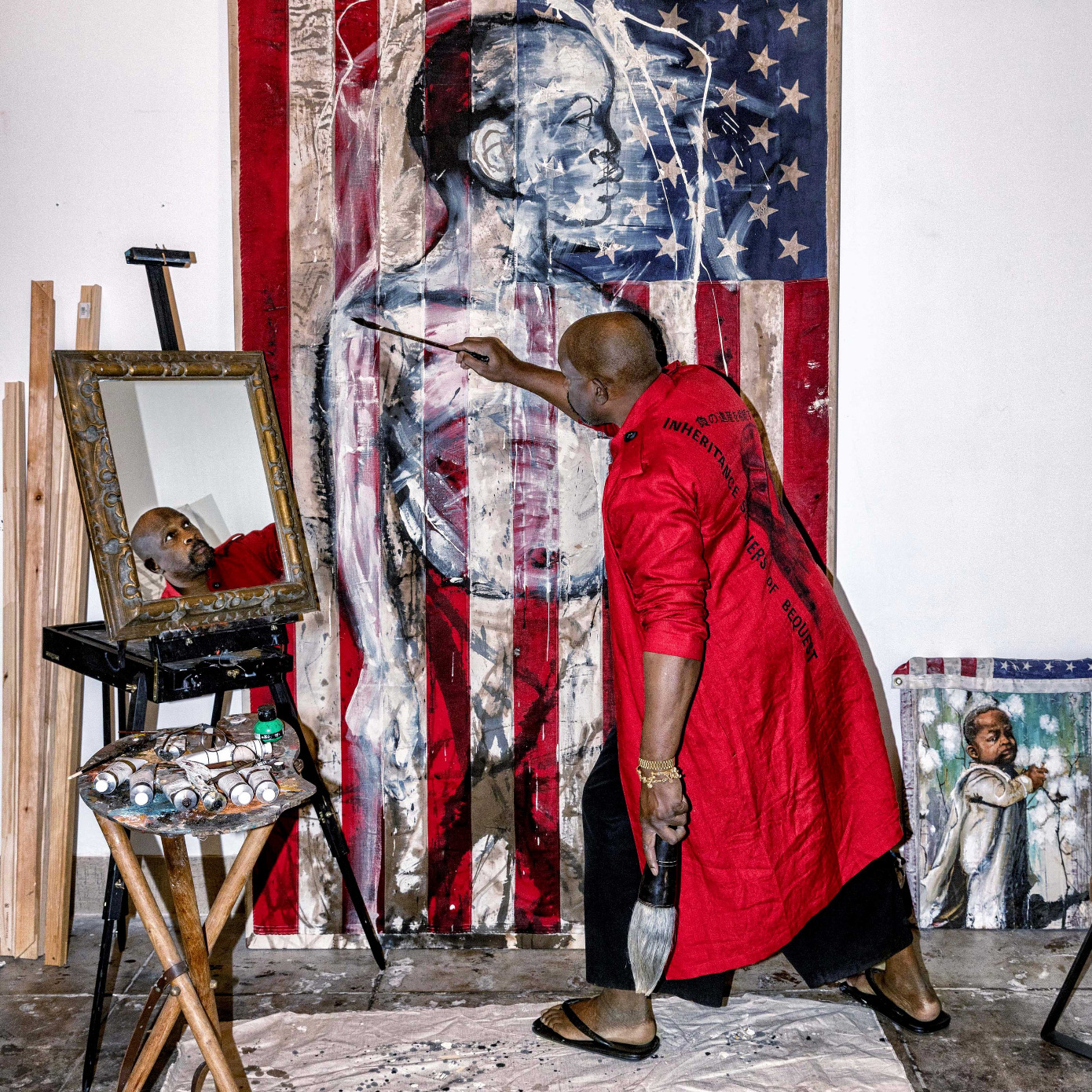 man painting in studio