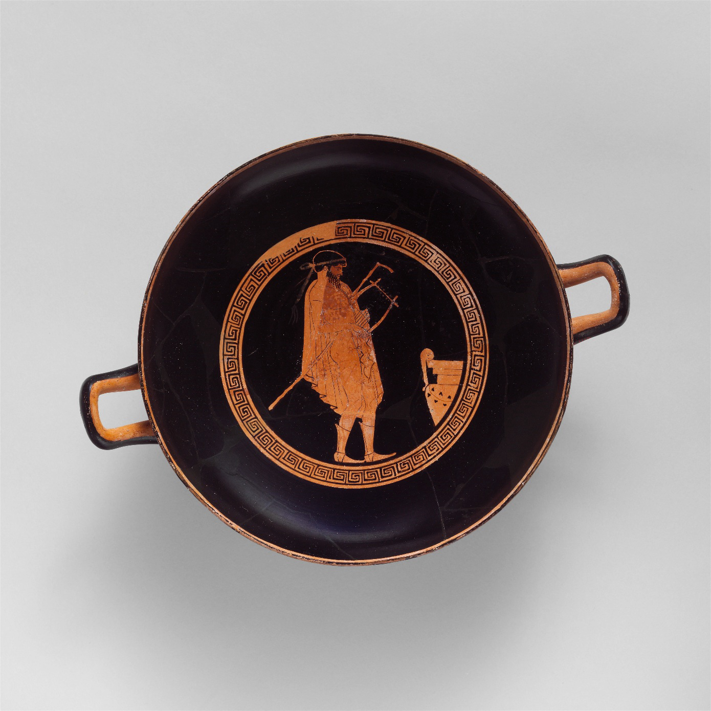 The ancient Terracotta kylix drinking cup.