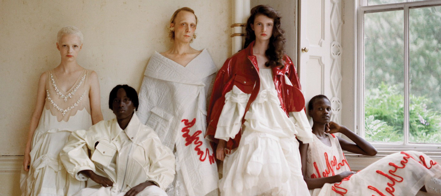 Five models posing in Simone Rocha's latest collection.