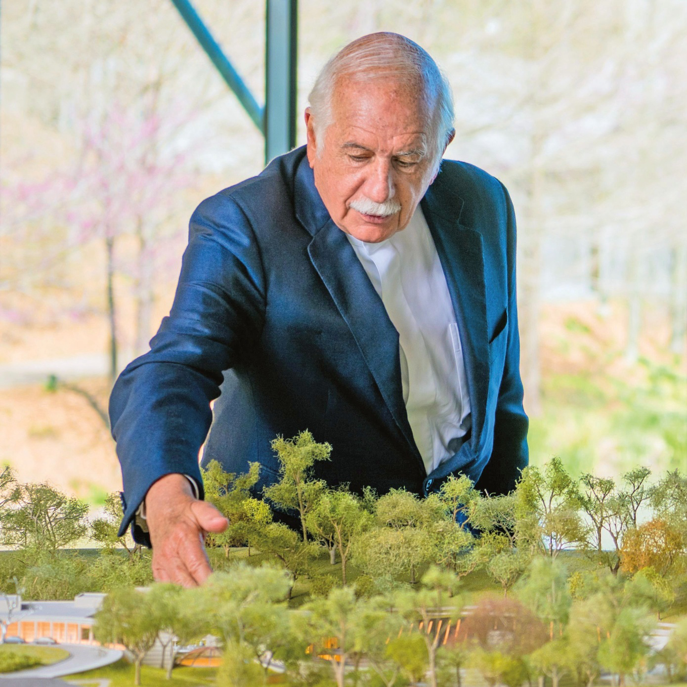 Moshe Safdie with a Building Model.