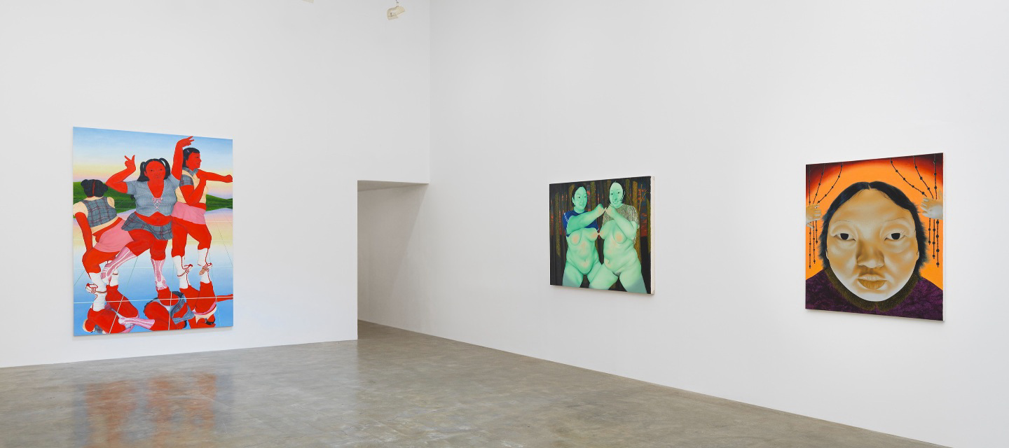 installation view of three paintings of figures