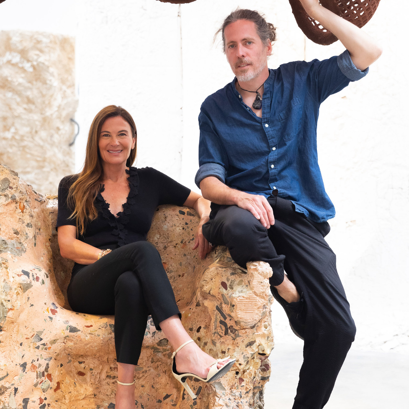 sarah harrelson and artist nacho carbonell with his sculpture