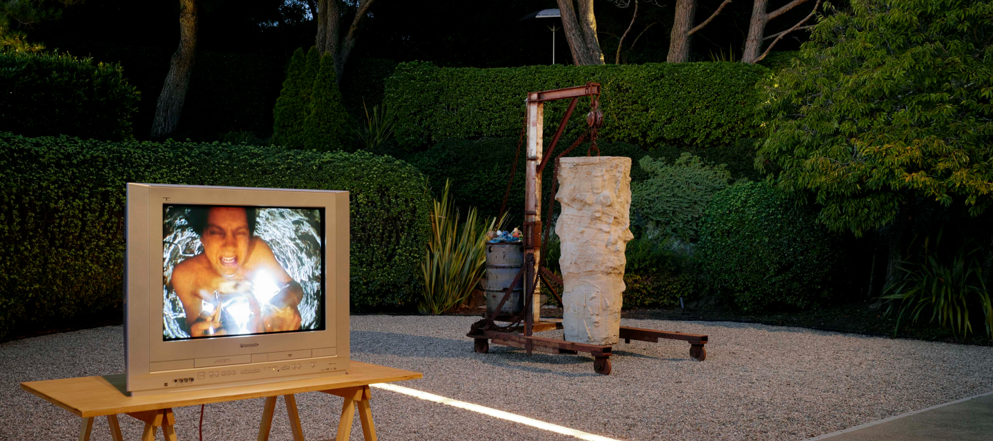 video work and sculpture in backyard