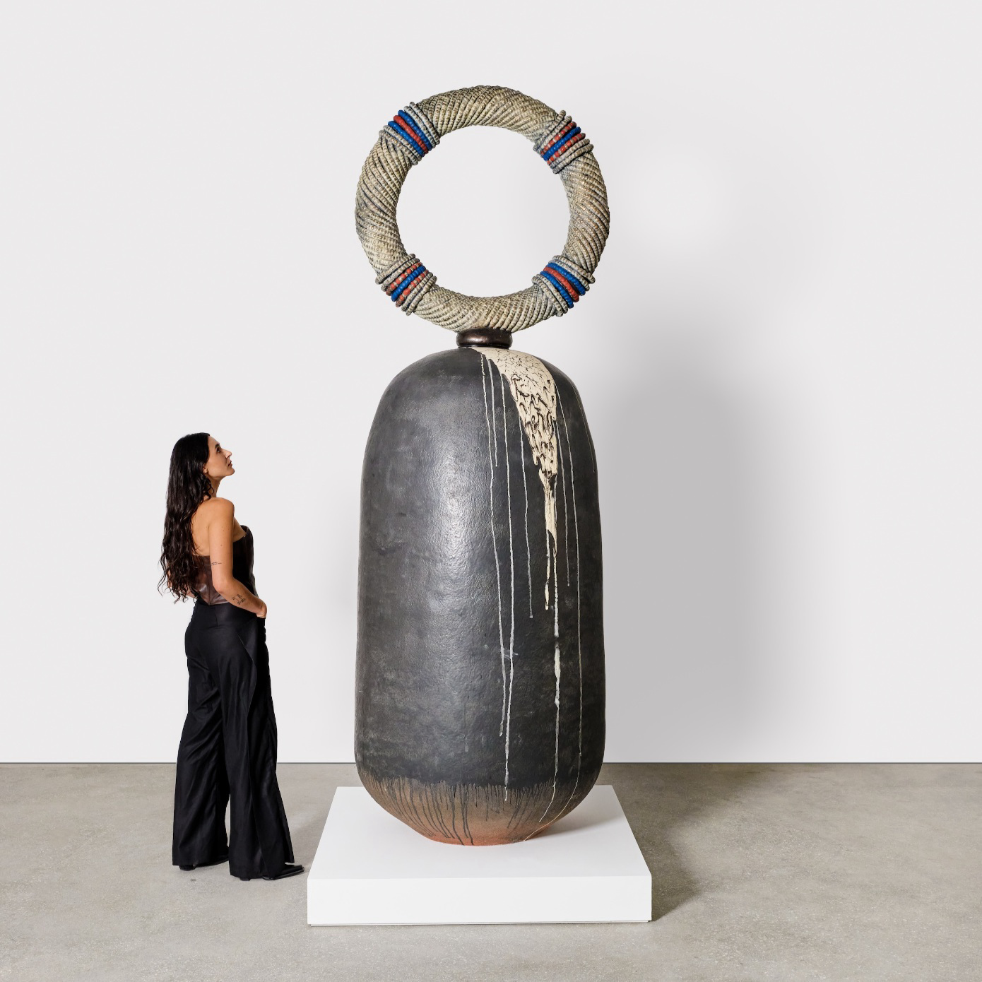 Zizipho-Poswa-Sculpture-With-Woman-Standing-Beside