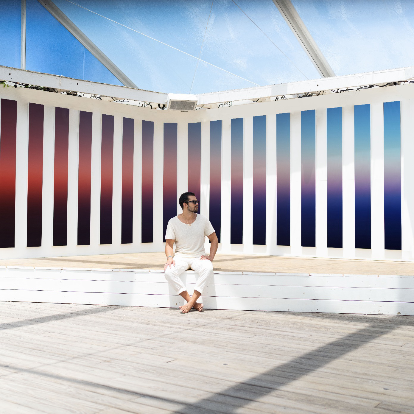 theo pinto in front of his lenticular painting