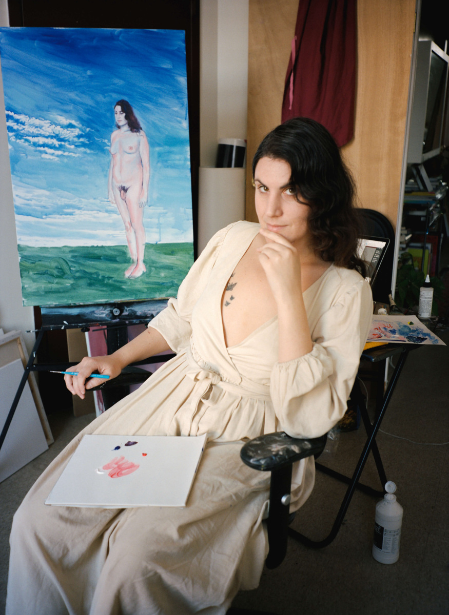 woman in chair painting