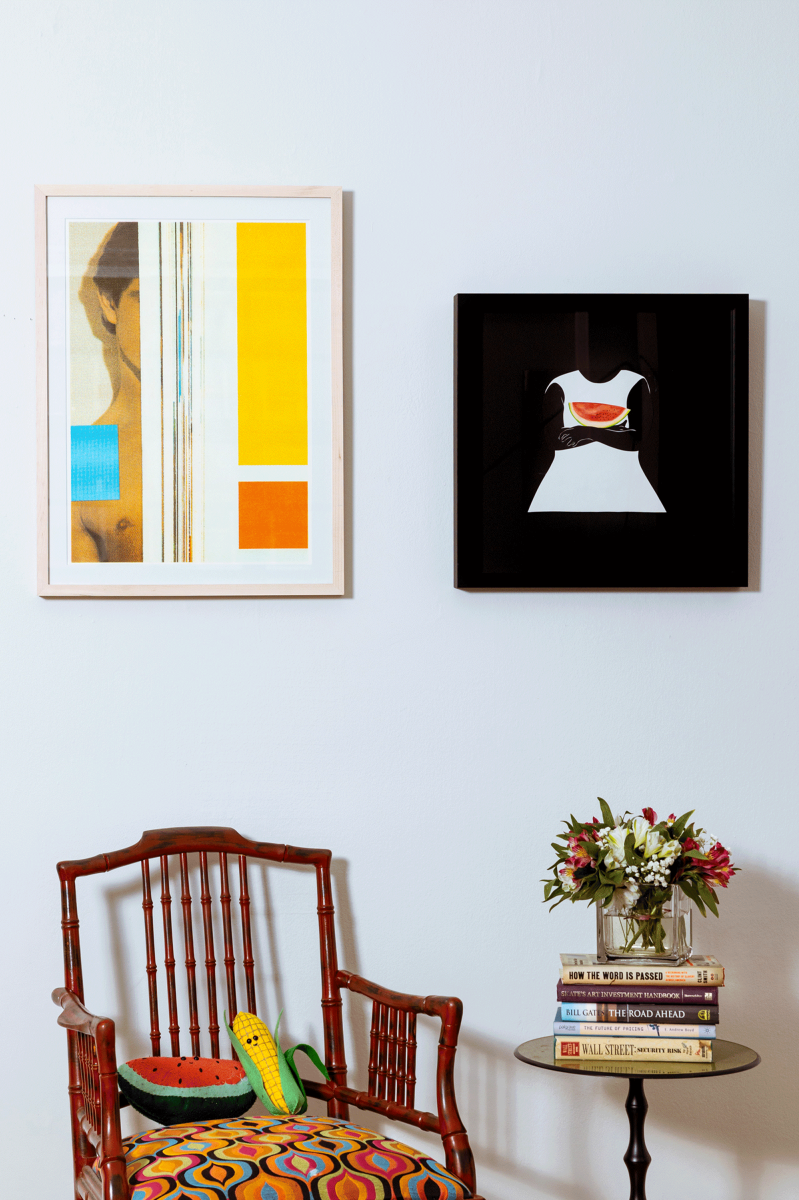 art on wall with chair
