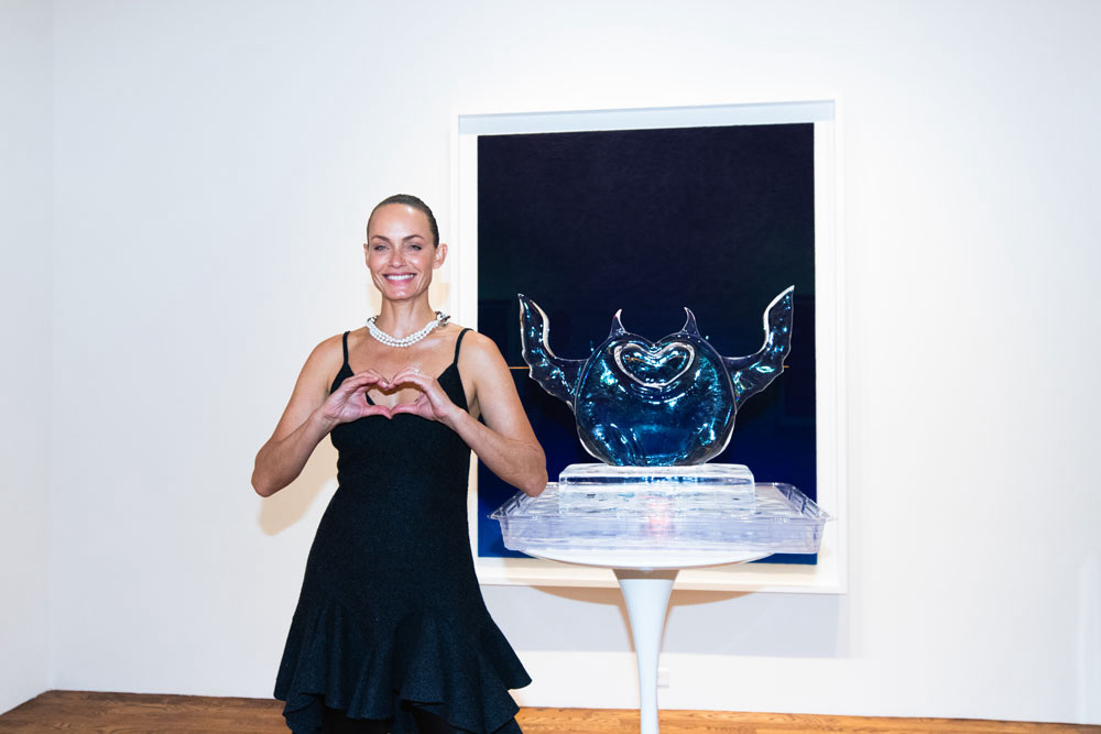 Supermodel Amber Valetta with the horned HEVEN ice sculpture.