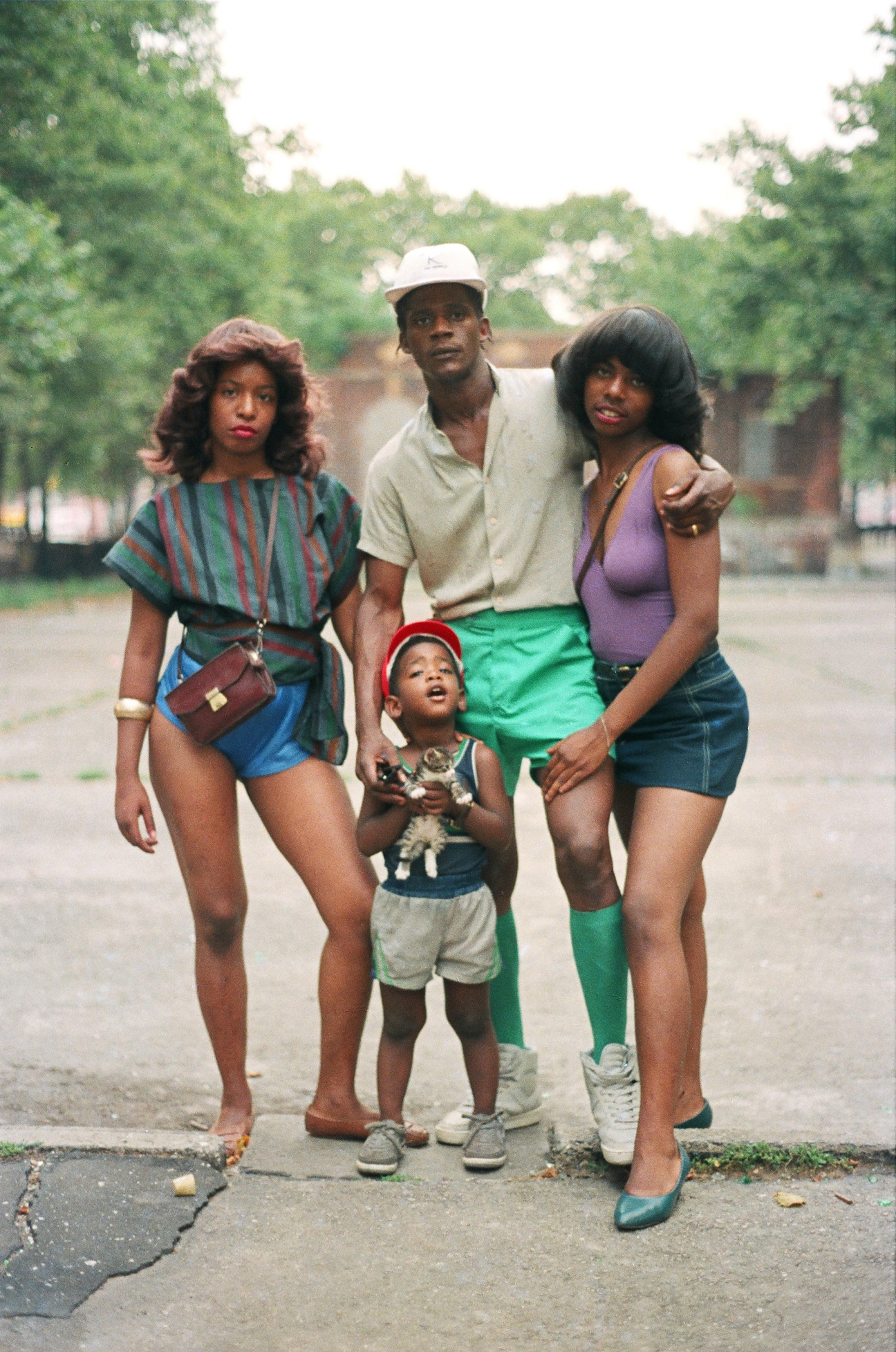 family standing in street