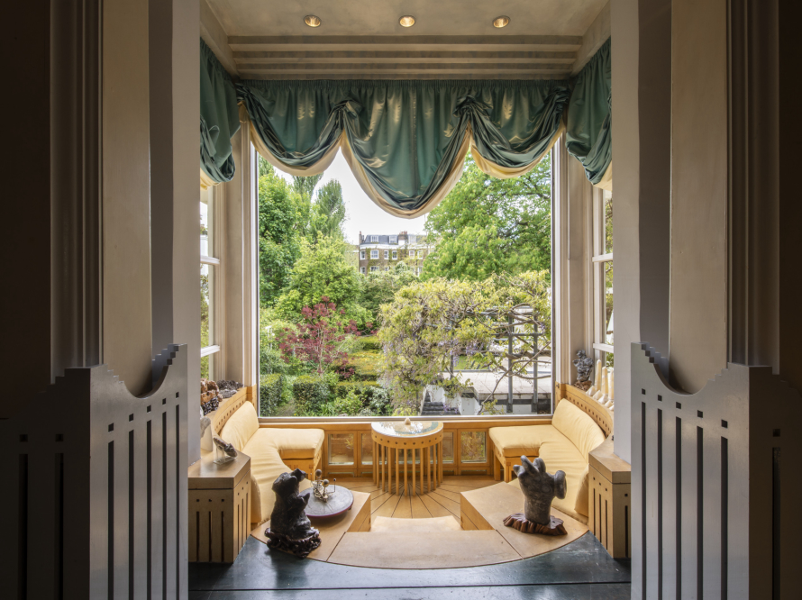 The Sundial Room faces south over the garden room with radial seating around a sundial.