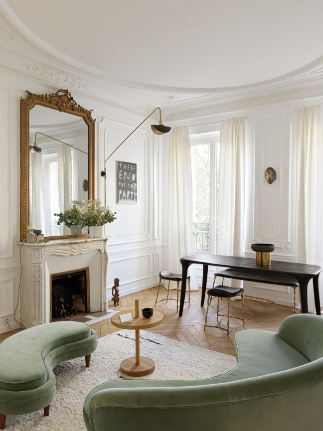 living room with green sofas