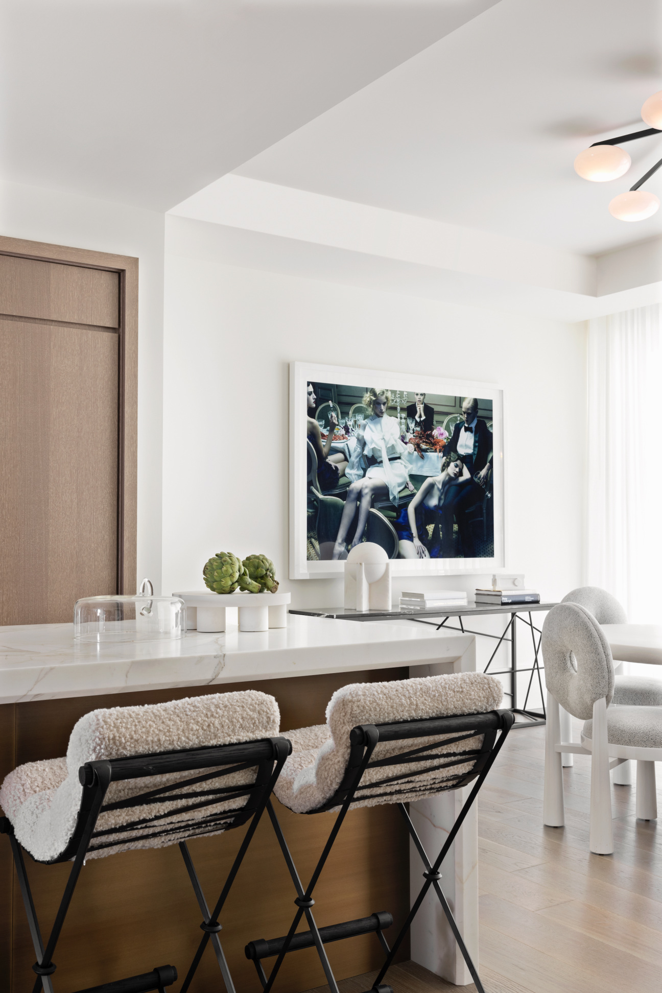 kitchen space with photo print of party in back