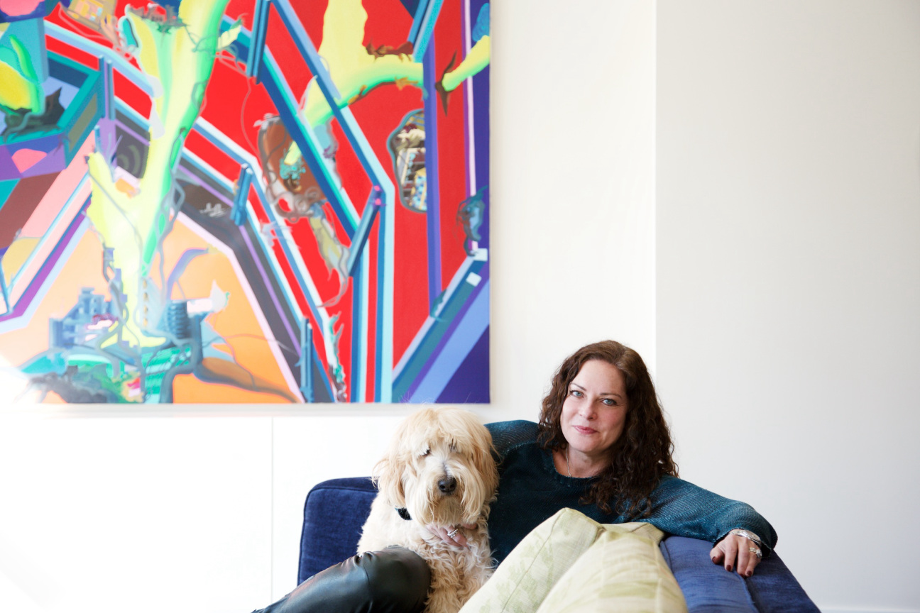 Woman sitting with her dog.