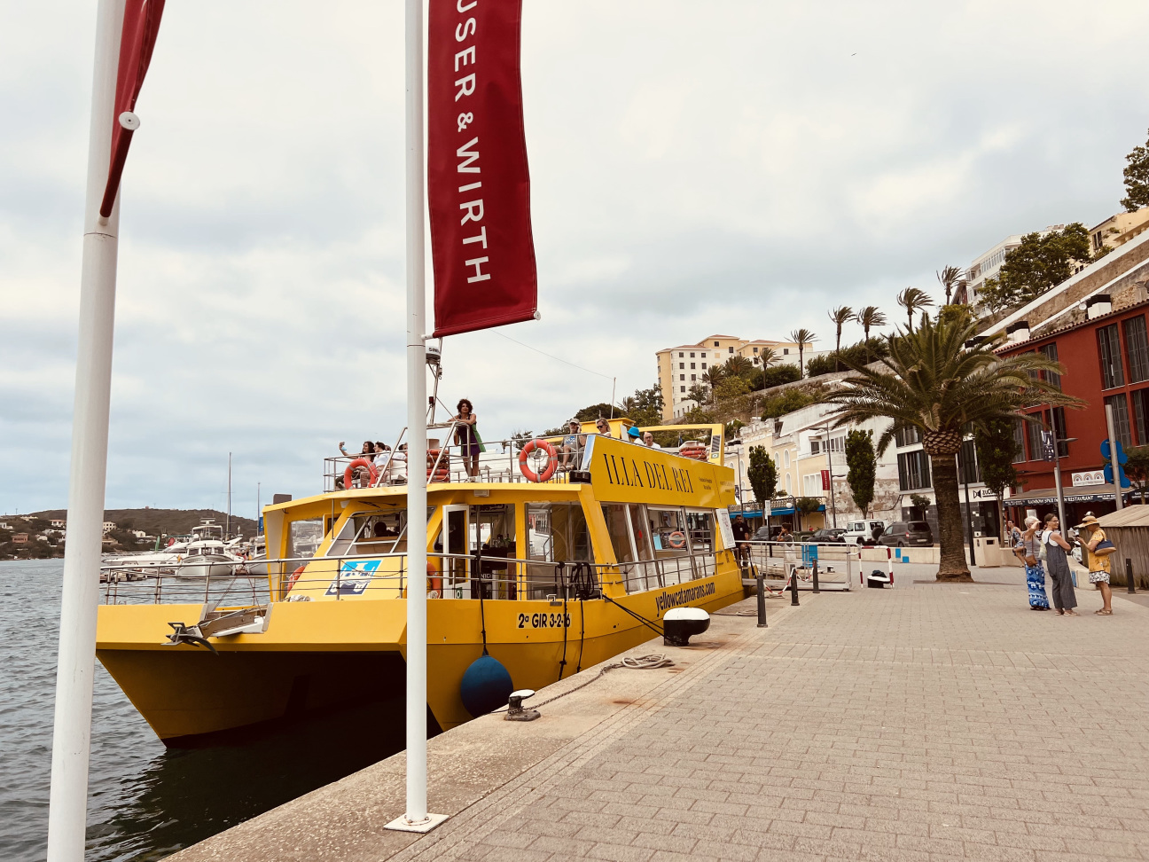 Yellow boat tied to a dock